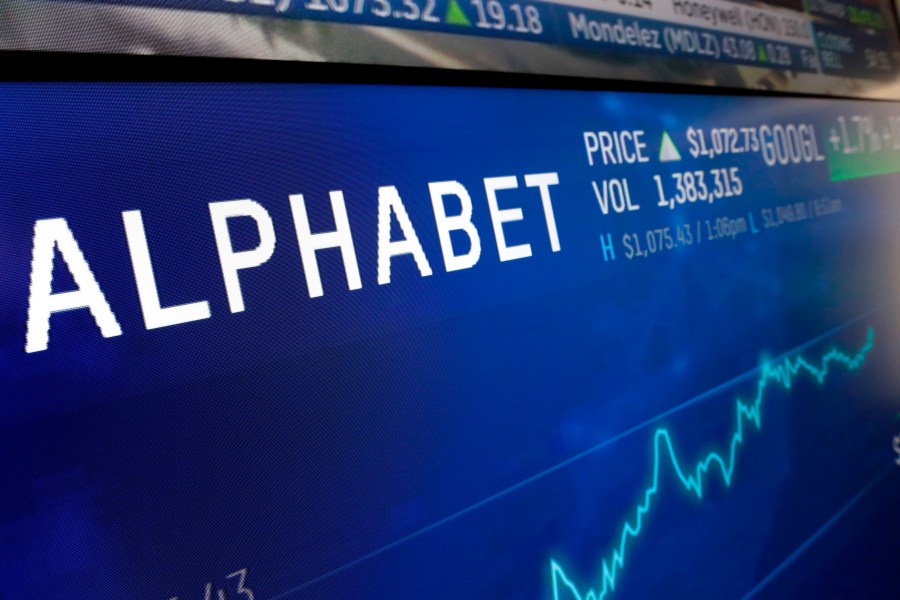 FILE - In this Feb. 14, 2018, file photo the logo for Alphabet appears on a screen at the Nasdaq MarketSite in New York. Alphabet reports earnings on Tuesday July 25, 2023. (AP Photo/Richard Drew, File)