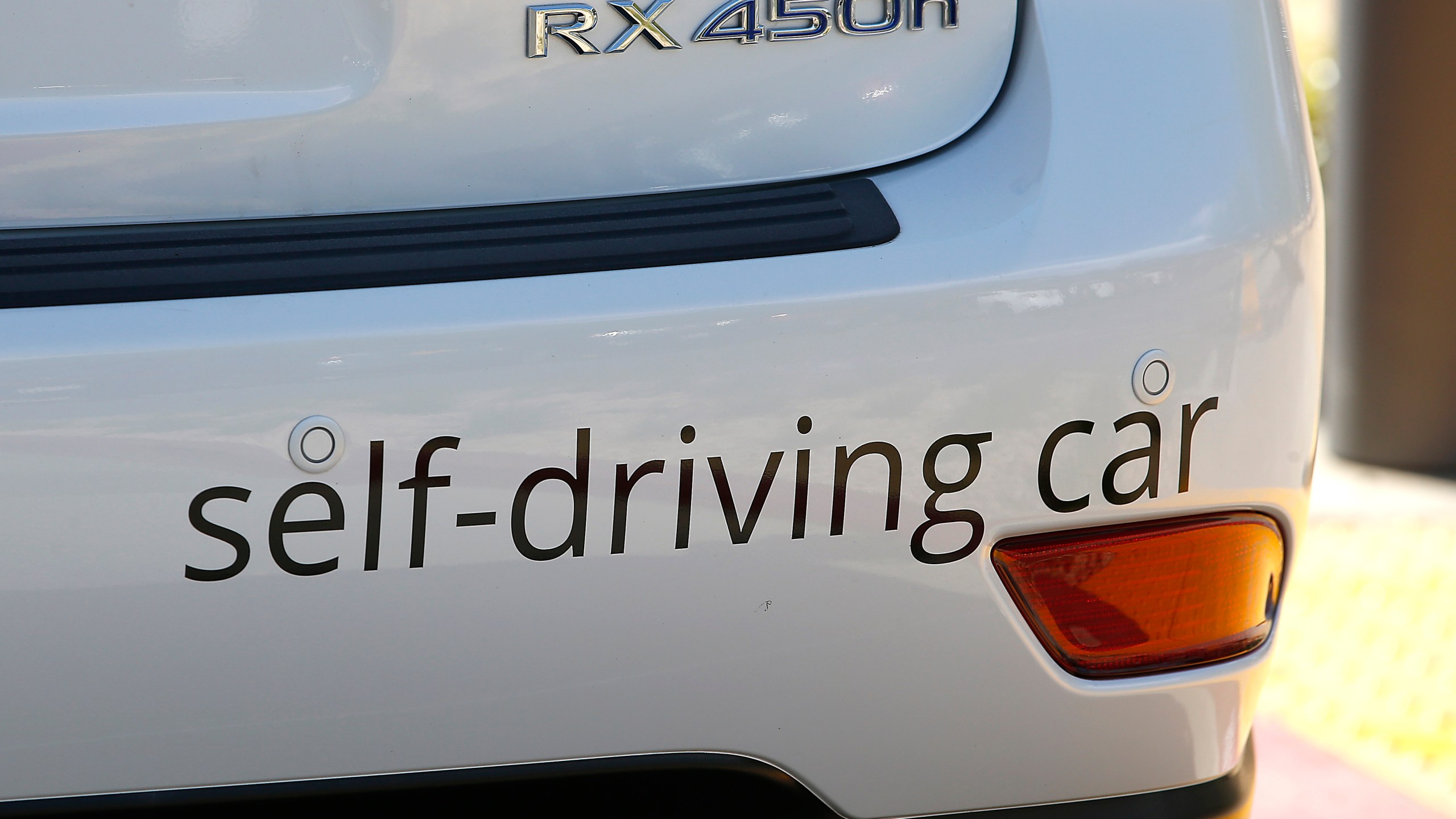 FILE - Google's self-driving Lexus car drives along street during a demonstration at Google campus on May 13, 2015, in Mountain View, Calif. Advocates for the self-driving vehicle industry on Wednesday, July 26, 2023, warned that years of regulatory inaction is putting American manufacturers at a competitive disadvantage and urged Congress to expand their ability to test and eventually sell autonomous cars and trucks. (AP Photo/Tony Avelar, File)