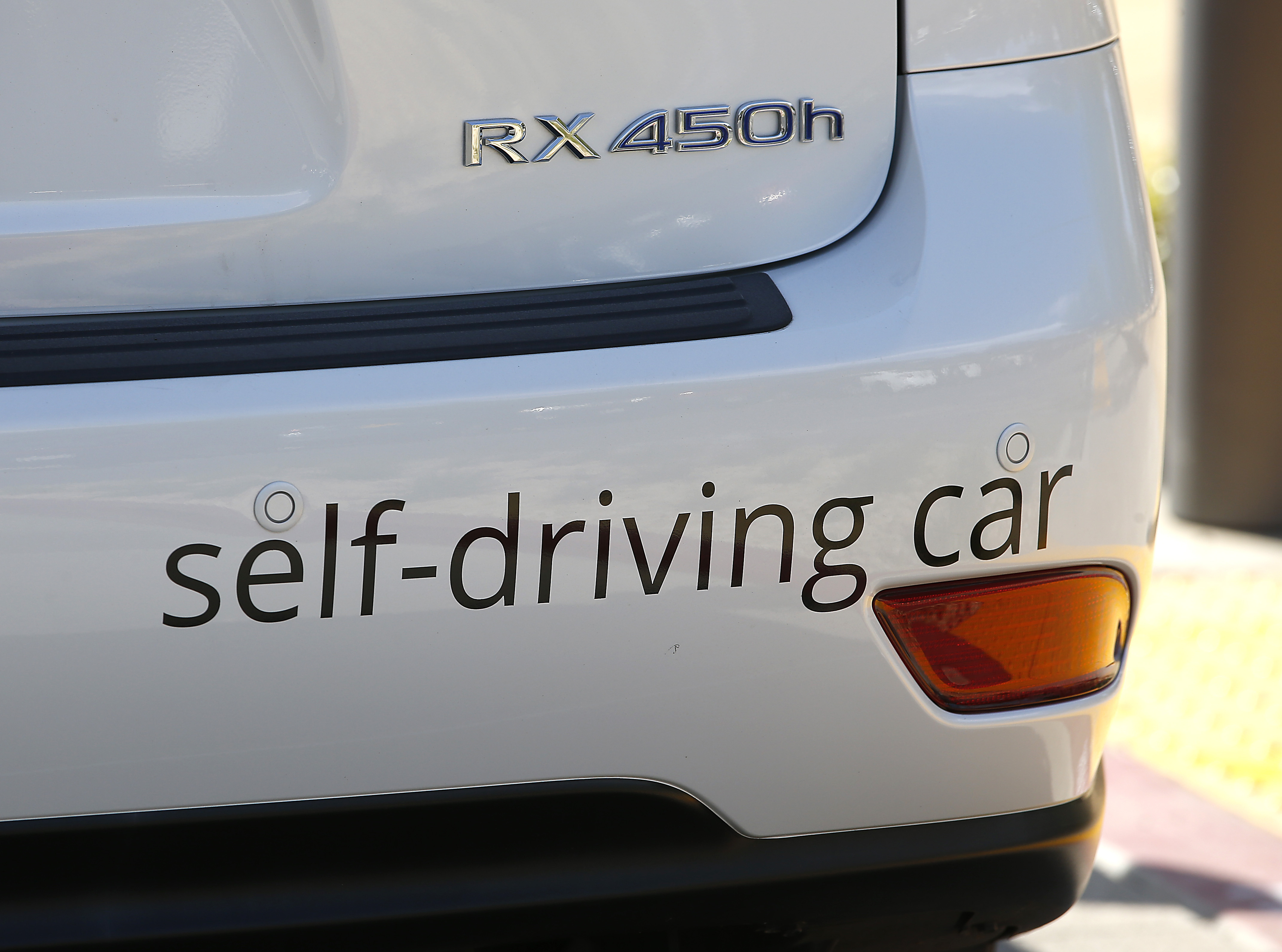 FILE - Google's self-driving Lexus car drives along street during a demonstration at Google campus on May 13, 2015, in Mountain View, Calif. Advocates for the self-driving vehicle industry on Wednesday, July 26, 2023, warned that years of regulatory inaction is putting American manufacturers at a competitive disadvantage and urged Congress to expand their ability to test and eventually sell autonomous cars and trucks. (AP Photo/Tony Avelar, File)