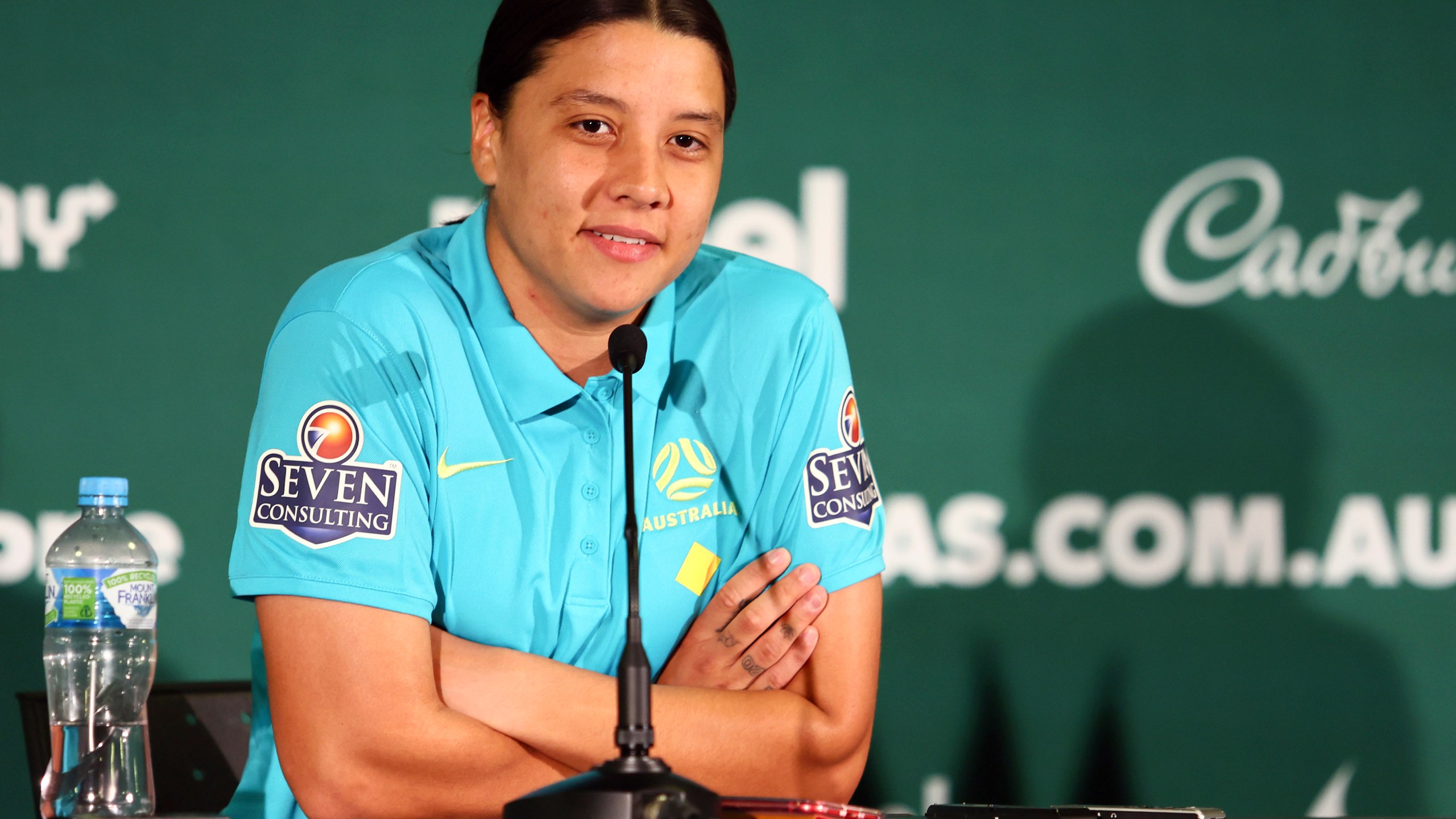 Australia's Women's World Cup captain Sam Kerr reacts during a press conference in Brisbane, Australia, Saturday, July 29, 2023. Kerr says she'll be available for Australia's must-win Women's World Cup game against Olympic champion Canada after missing the team's first two group games because of a calf muscle injury. (AP Photo/Tertius Pickard)