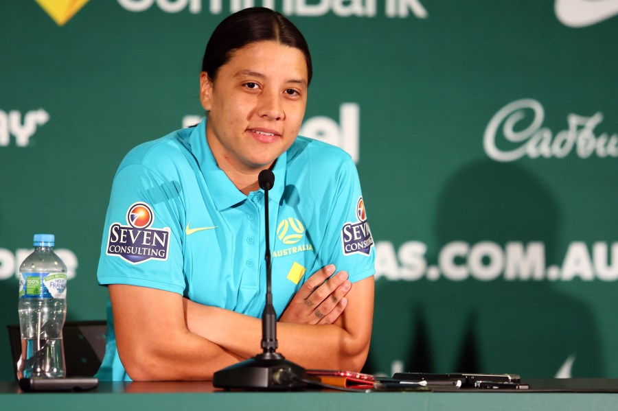 Australia's Women's World Cup captain Sam Kerr reacts during a press conference in Brisbane, Australia, Saturday, July 29, 2023. Kerr says she'll be available for Australia's must-win Women's World Cup game against Olympic champion Canada after missing the team's first two group games because of a calf muscle injury. (AP Photo/Tertius Pickard)