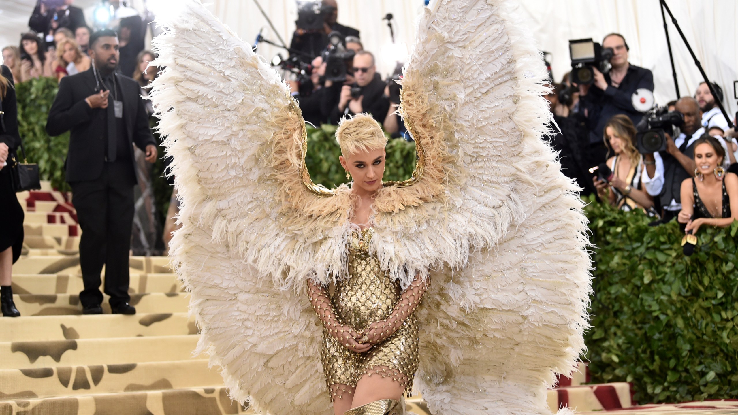 FILE - Katy Perry attends The Metropolitan Museum of Art's Costume Institute benefit gala celebrating the opening of the Heavenly Bodies: Fashion and the Catholic Imagination exhibition on Monday, May 7, 2018, in New York. (Photo by Evan Agostini/Invision/AP, File)