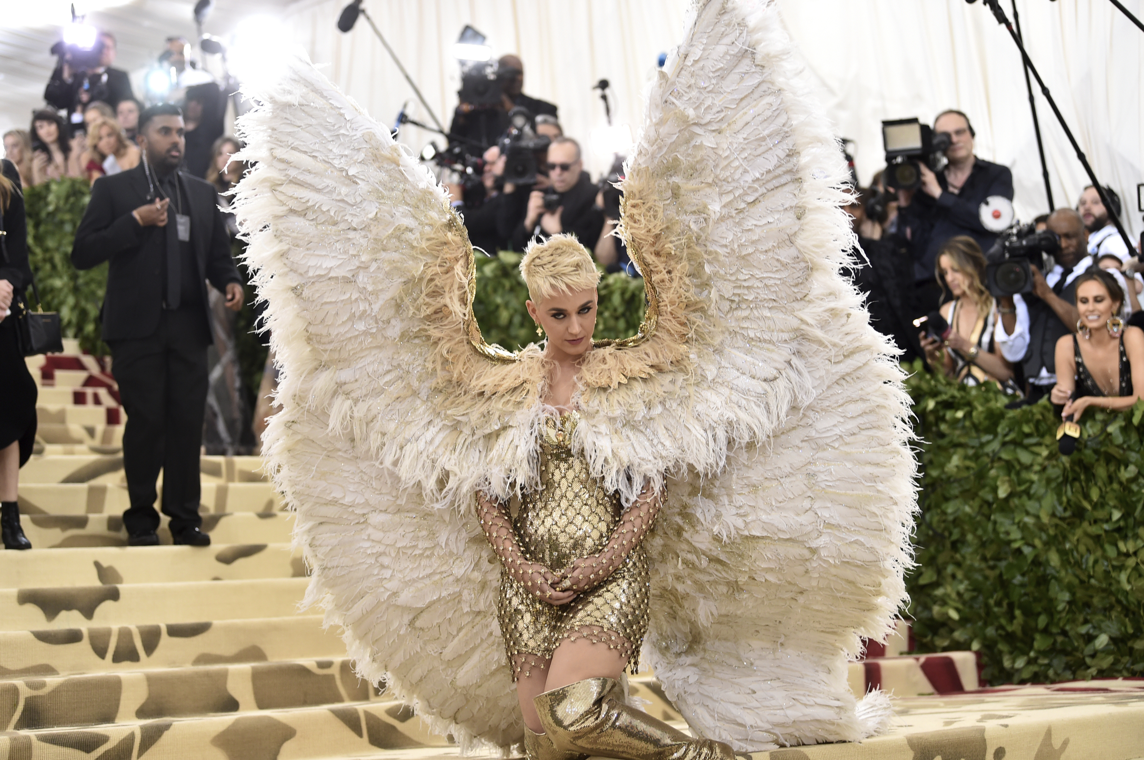 FILE - Katy Perry attends The Metropolitan Museum of Art's Costume Institute benefit gala celebrating the opening of the Heavenly Bodies: Fashion and the Catholic Imagination exhibition on Monday, May 7, 2018, in New York. (Photo by Evan Agostini/Invision/AP, File)