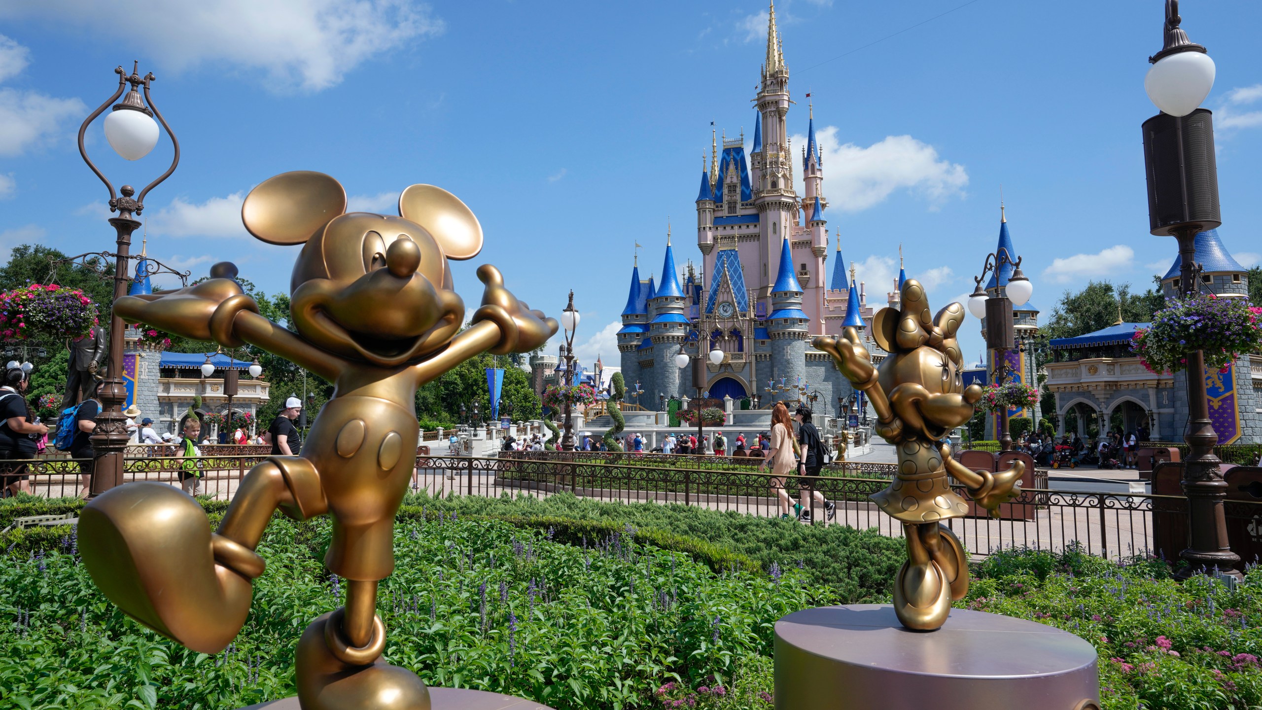 The Cinderella Castle is seen at the Magic Kingdom at Walt Disney World Friday, July 14, 2023, in Lake Buena Vista, Fla. Disney is asking a Florida judge to toss out a lawsuit filed by Gov. Ron DeSantis' appointees to Disney World's governing district.(AP Photo/John Raoux)