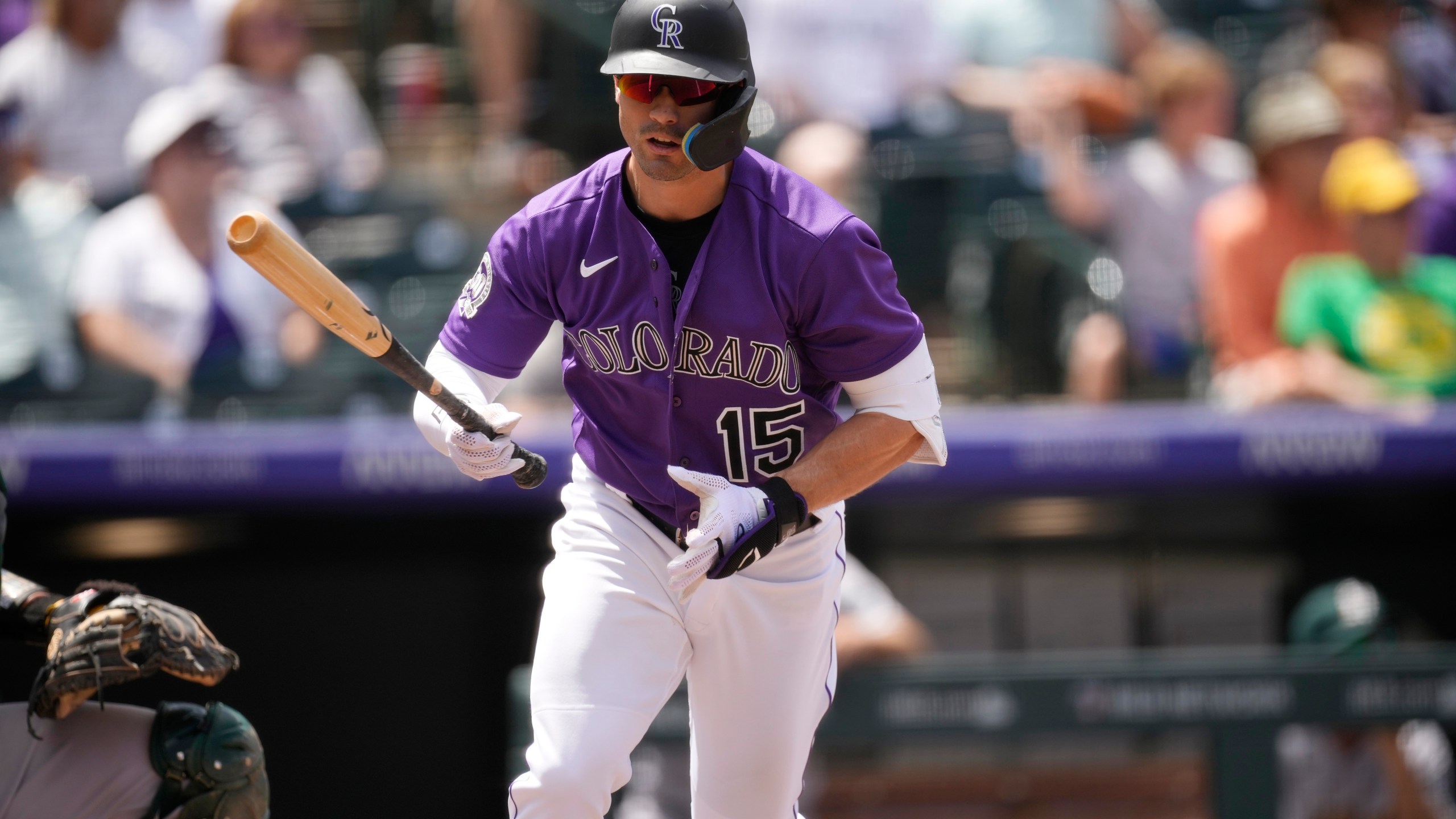 Colorado Rockies' Randal Grichuk drops his bat as he flies out against Oakland Athletics starting pitcher Luis Medina to end the third inning of a baseball game Sunday, July 30, 2023, in Denver. (AP Photo/David Zalubowski)