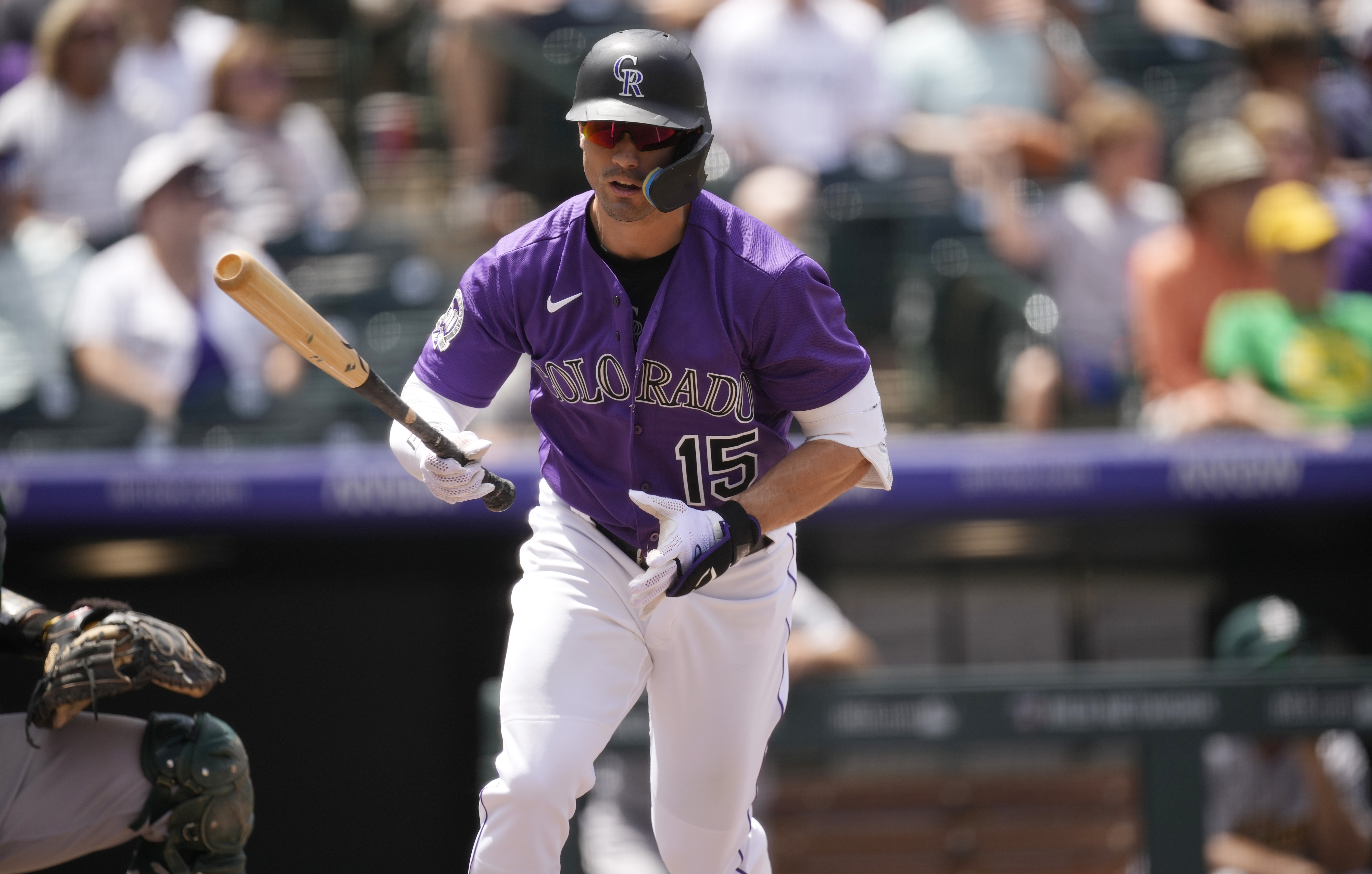 Colorado Rockies' Randal Grichuk drops his bat as he flies out against Oakland Athletics starting pitcher Luis Medina to end the third inning of a baseball game Sunday, July 30, 2023, in Denver. (AP Photo/David Zalubowski)