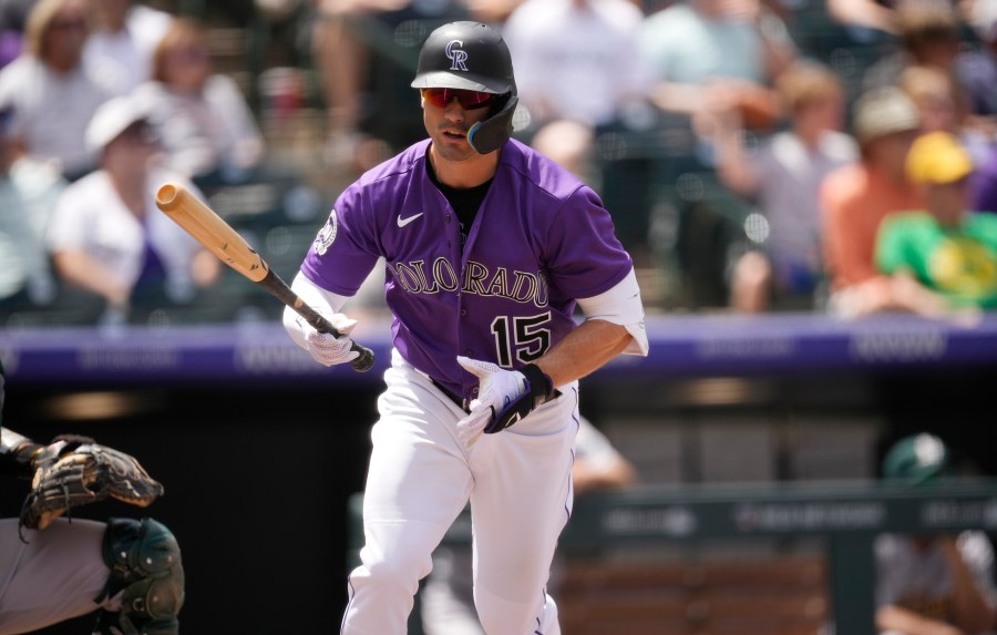 Colorado Rockies' Randal Grichuk drops his bat as he flies out against Oakland Athletics starting pitcher Luis Medina to end the third inning of a baseball game Sunday, July 30, 2023, in Denver. (AP Photo/David Zalubowski)