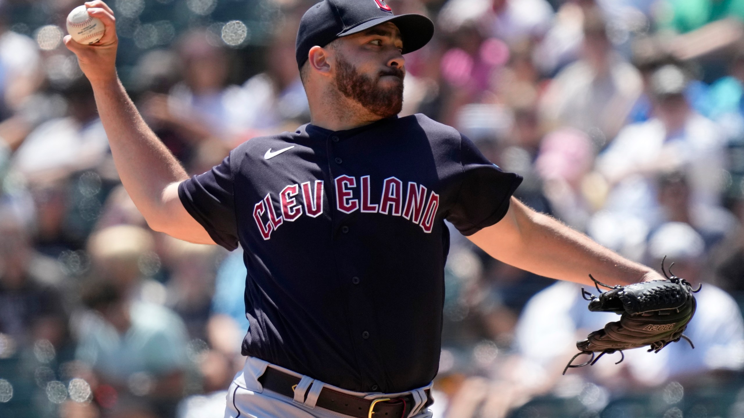 Cleveland Guardians starting pitcher Aaron Civale throws against the Chicago White Sox during the first inning of a baseball game in Chicago, Sunday, July 30, 2023. (AP Photo/Nam Y. Huh)