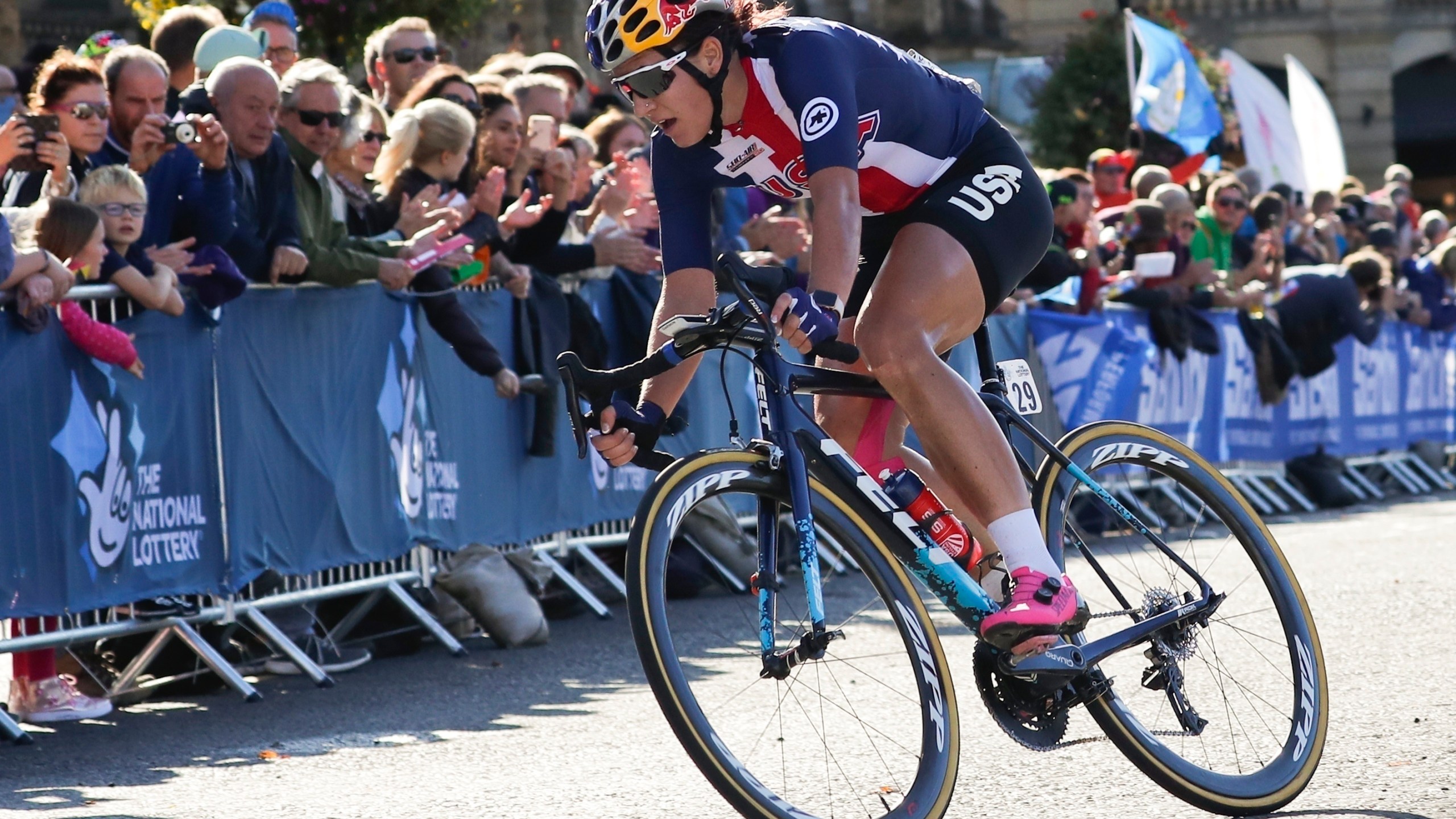 FILE - United States' Chloe Dygert pedals during the women elite race at the road cycling World Championships in Harrogate, England, Sept. 28, 2019. Dygert's cycling career nearly ended at the bottom of a ravine following a terrible crash at the world championships. The comeback of the two-time Olympian to the top of the sport has been a daunting one, waylaid by the Epstein-Barr virus, more surgeries to repair the injuries to her leg, and another crash just this past January. (AP Photo/Manu Fernandez, File)