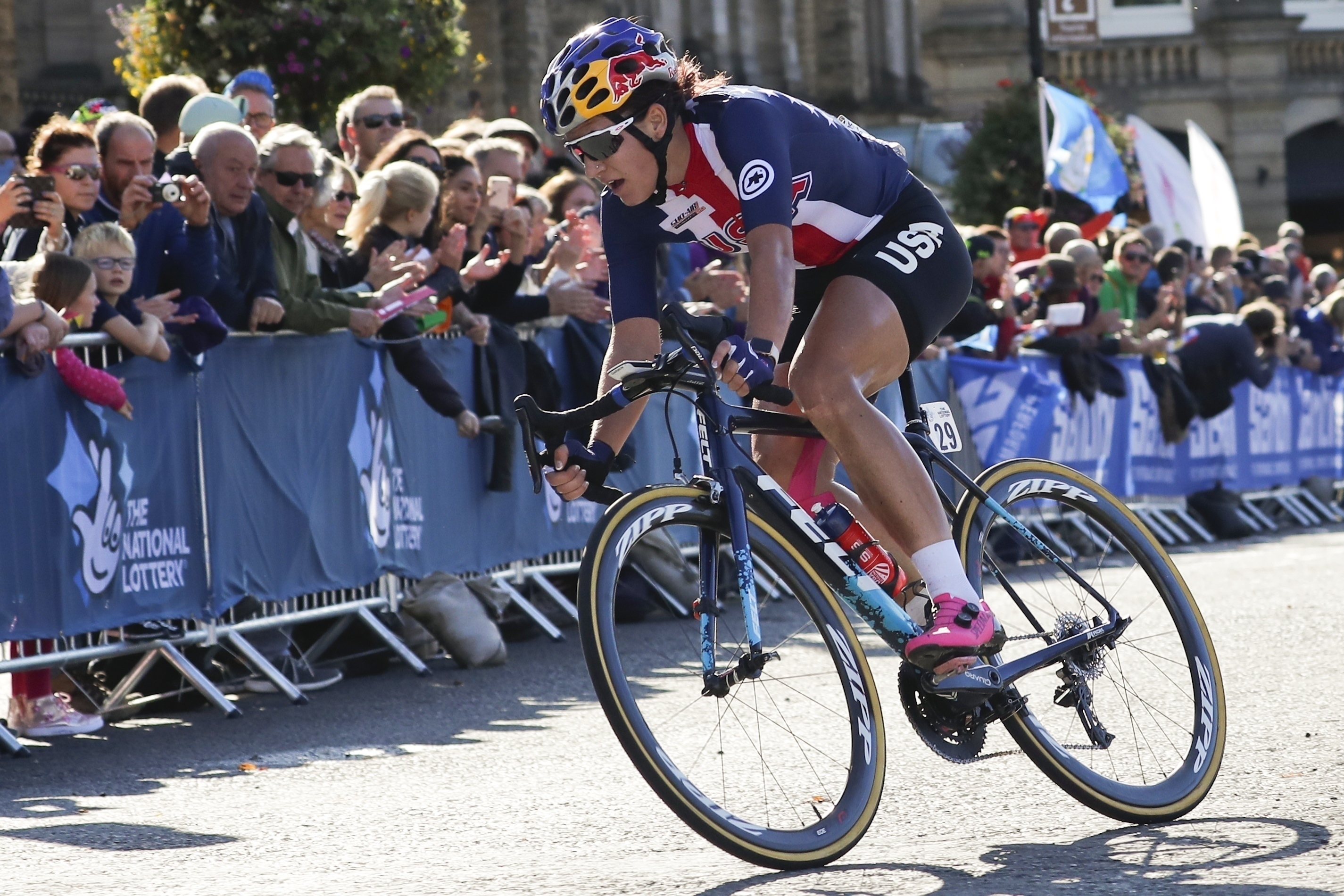 FILE - United States' Chloe Dygert pedals during the women elite race at the road cycling World Championships in Harrogate, England, Sept. 28, 2019. Dygert's cycling career nearly ended at the bottom of a ravine following a terrible crash at the world championships. The comeback of the two-time Olympian to the top of the sport has been a daunting one, waylaid by the Epstein-Barr virus, more surgeries to repair the injuries to her leg, and another crash just this past January. (AP Photo/Manu Fernandez, File)