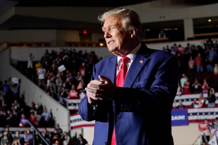 Republican presidential candidate former President Donald Trump gestures as he leaves a campaign rally Saturday, July 29, 2023, in Erie, Pa. (AP Photo/Sue Ogrocki)