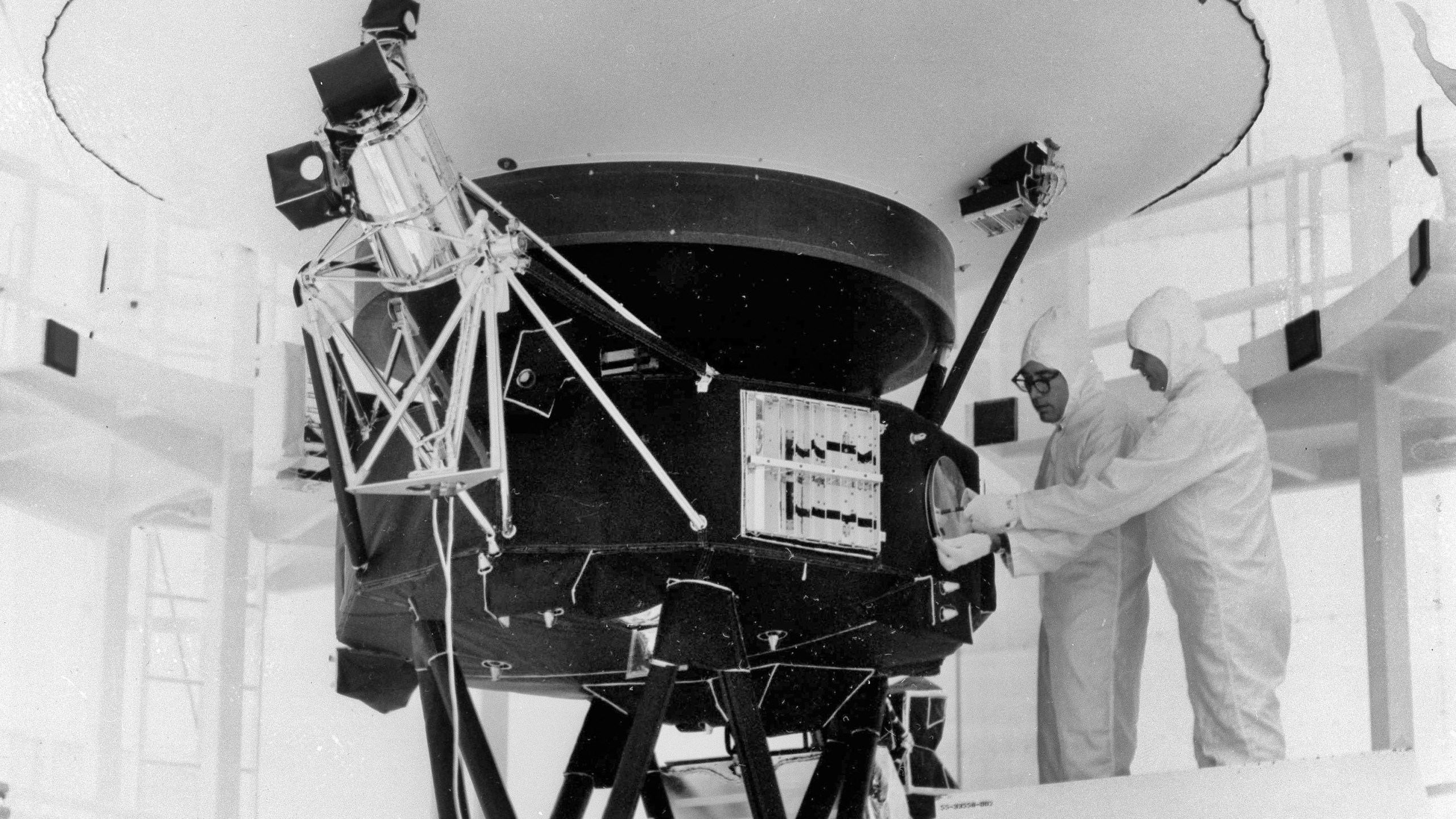 FILE - In this Aug. 4, 1977, photo provided by NASA, the "Sounds of Earth" record is mounted on the Voyager 2 spacecraft in the Safe-1 Building at the Kennedy Space Center, Fla., prior to encapsulation in the protective shroud. NASA is listening for any peep from Voyager 2 after losing contact with the spacecraft billions of miles away. (AP Photo/NASA, File)