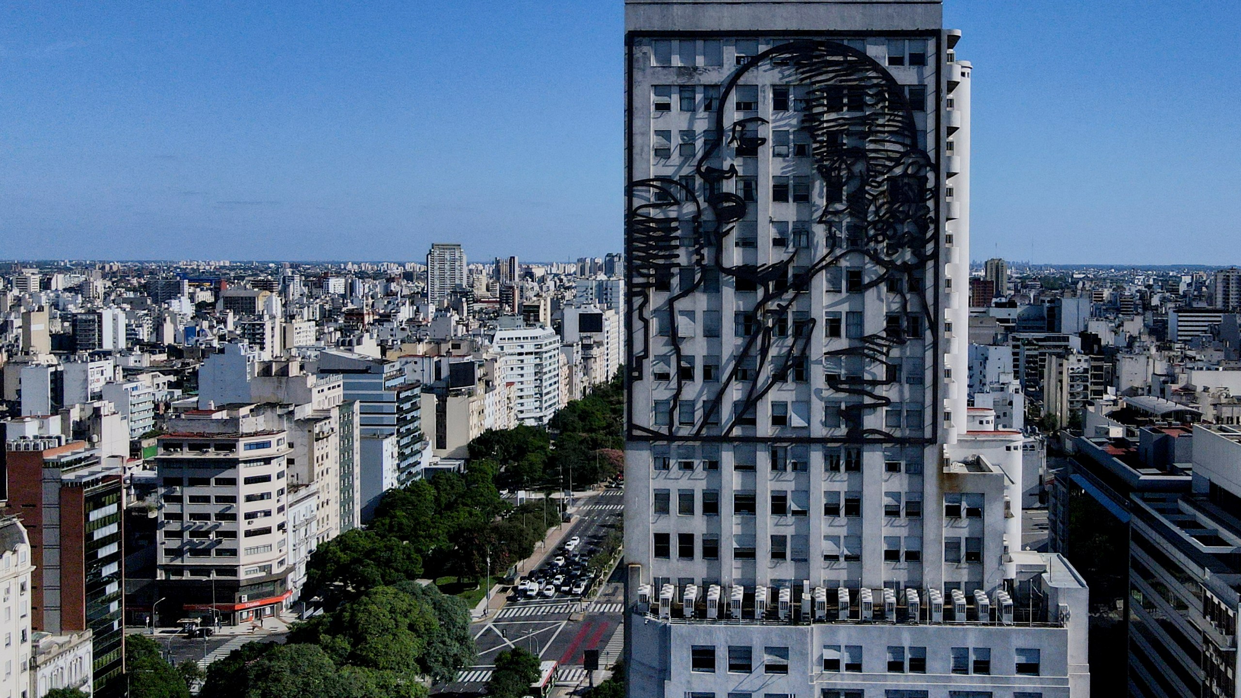 An iron sculpture depicting Argentine former first lady María Eva Duarte de Perón, better known as Eva Perón, or Evita, adorns a facade of the Ministry of Human Capital, on Avenida 9 de Julio in Buenos Aires, Argentina, Tuesday, Feb. 13, 2024. (AP Photo/Natacha Pisarenko)