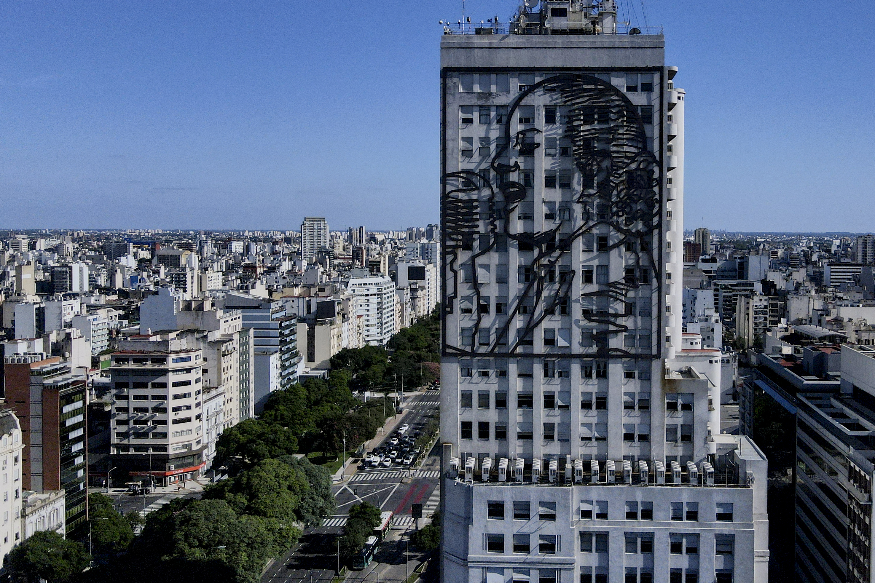 An iron sculpture depicting Argentine former first lady María Eva Duarte de Perón, better known as Eva Perón, or Evita, adorns a facade of the Ministry of Human Capital, on Avenida 9 de Julio in Buenos Aires, Argentina, Tuesday, Feb. 13, 2024. (AP Photo/Natacha Pisarenko)