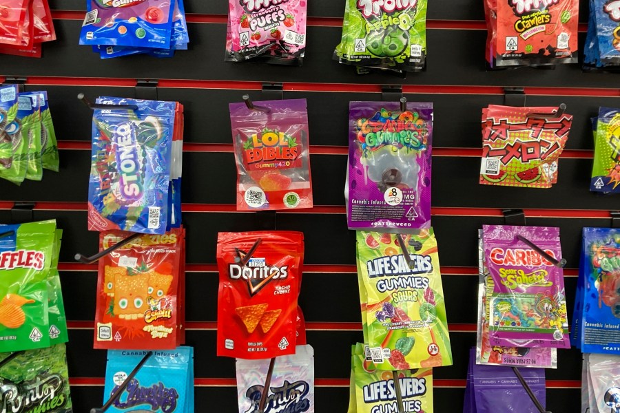 FILE - Products advertised as containing synthetically derived delta-8 THC are offered for sale at a smoke shop in north Seattle on Feb. 25, 2022. (AP Photo/Gene Johnson, File)