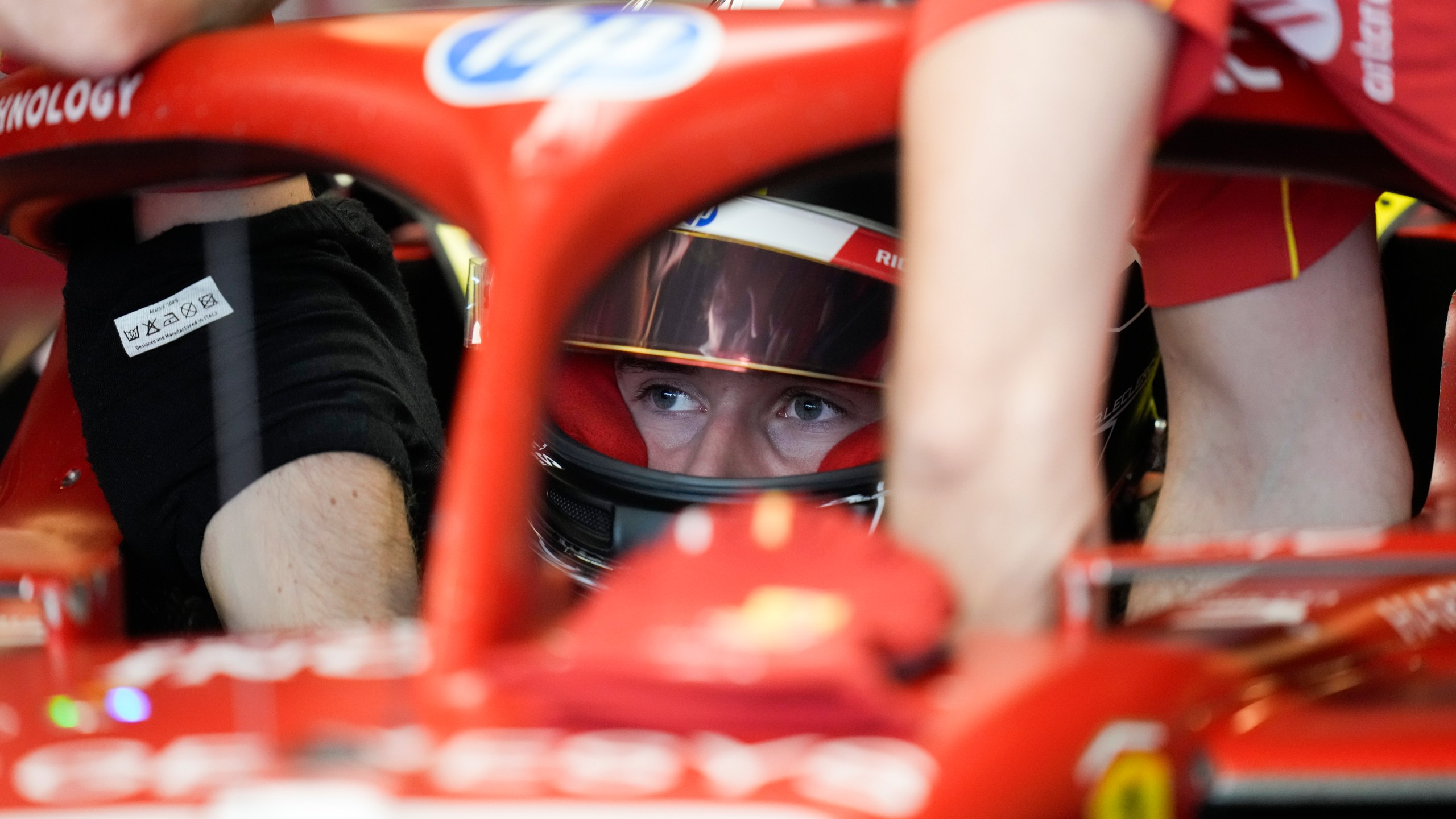 Ferrari driver Arthur Leclerc of Monaco prepares for his debut free practice ahead of the Formula One Abu Dhabi Grand Prix at the Yas Marina Circuit in Abu Dhabi, UAE, Friday, Dec. 6, 2024. (AP Photo/Darko Bandic)