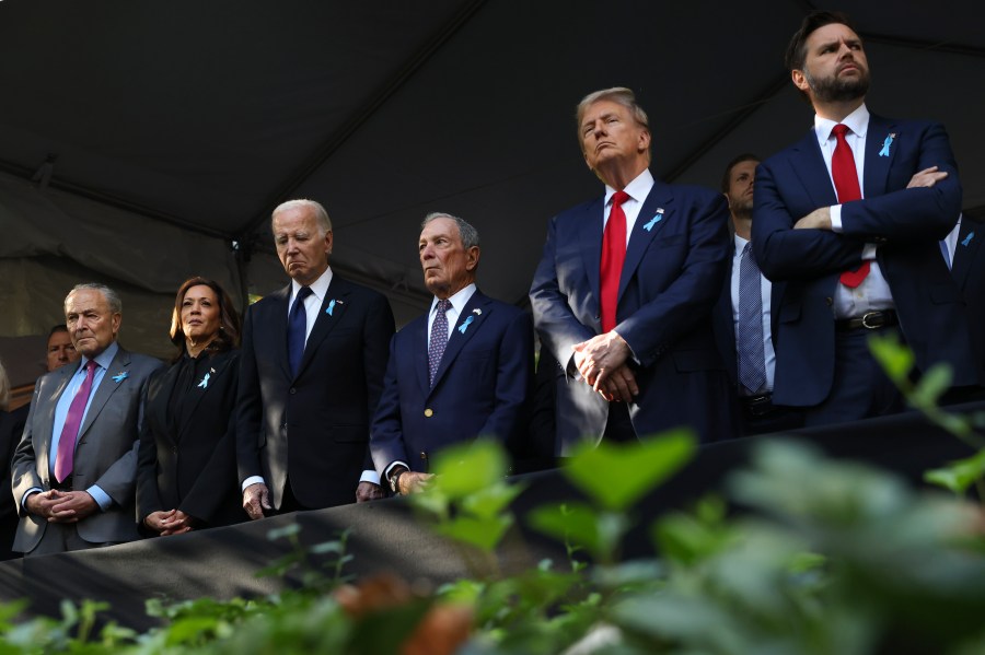 FILE - From left, Sen. Chuck Schumer, D-NY, Democratic presidential nominee Vice President Kamala Harris, President Joe Biden, Michael Bloomberg, Republican presidential nominee former President Donald Trump and Republican vice presidential nominee Sen. JD Vance, R-Ohio, attend the 9/11 Memorial ceremony on the 23rd anniversary of the Sept. 11, 2001 attacks, on Sept. 11, 2024, in New York. (AP Photo/Yuki Iwamura, File)