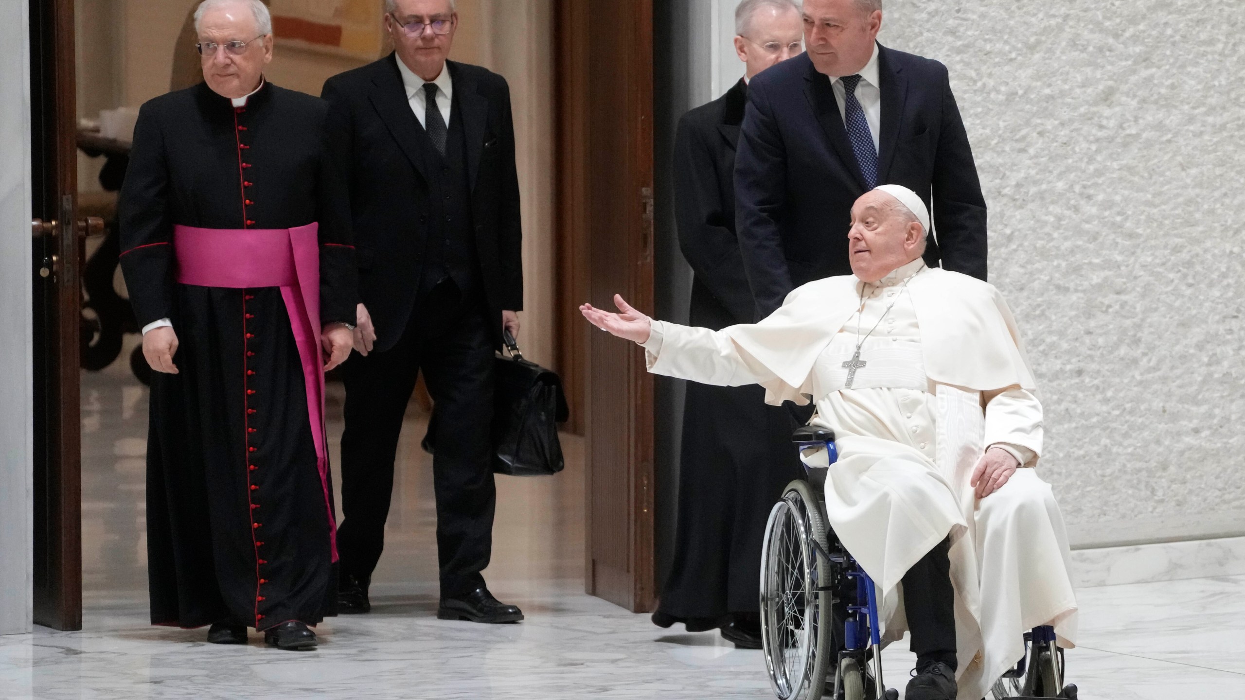 Pope Francis arrives in the Paul VI hall on the occasion of the weekly general audience at the Vatican, Wednesday, Jan. 15, 2025. (AP Photo/Gregorio Borgia)