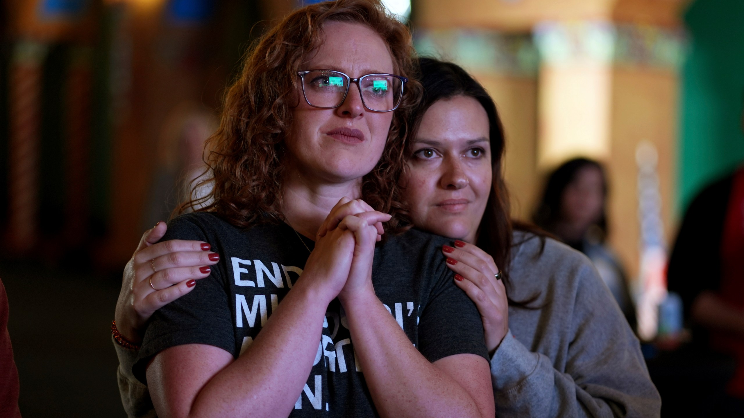 FILE - People giving their first names Erika, left, and Leeann react after an abortion rights amendment to the Missouri constitution passed, Tuesday, Nov. 5, 2024, at a watch party in Kansas City, Mo. (AP Photo/Charlie Riedel, File)