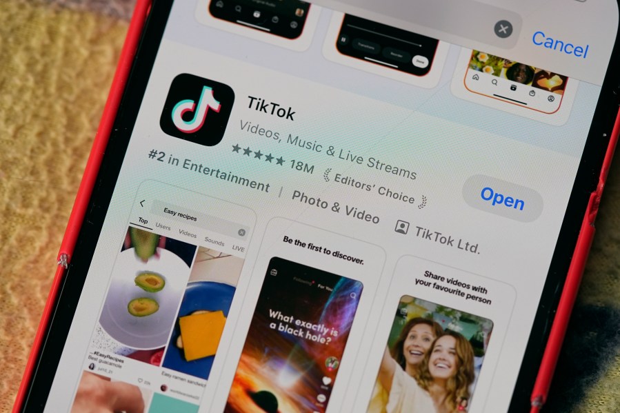 The logo for TikTok is displayed on a mobile phone, Friday, Jan. 17, 2025, in Denver. (AP Photo/David Zalubowski)