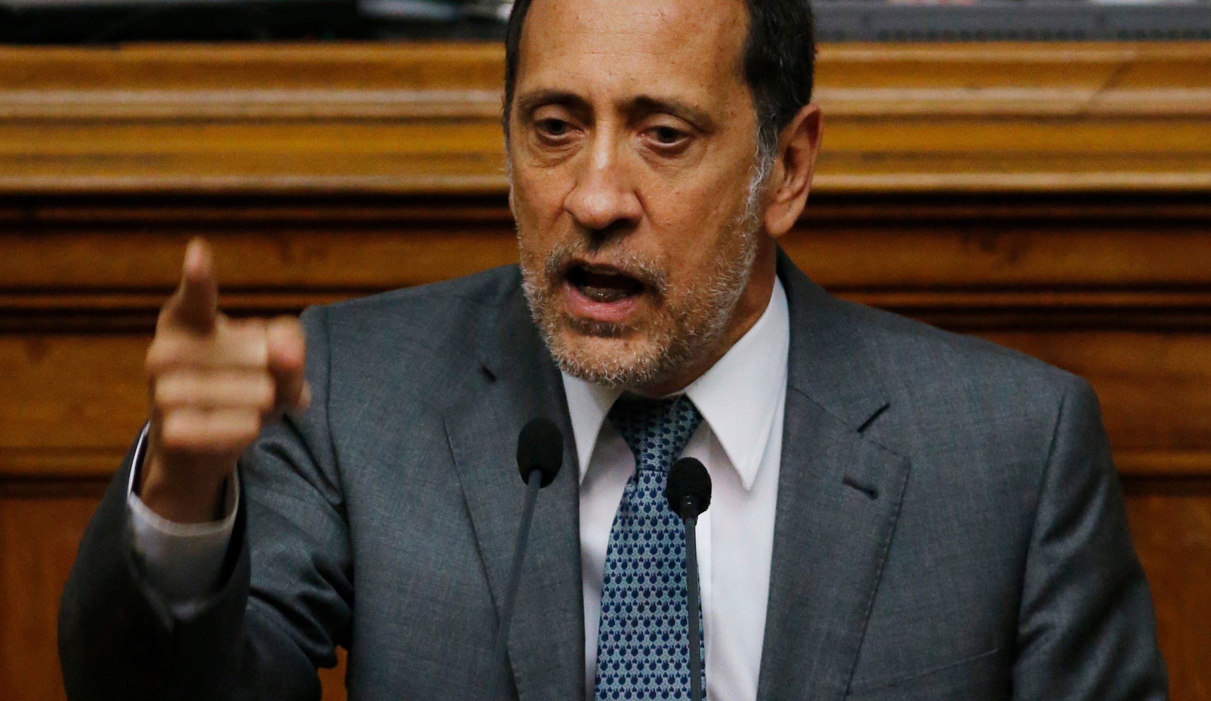 FILE - Opposition lawmaker and economist Jose Guerra speaks during a congressional session in Caracas, Venezuela, Jan. 22, 2016. (AP Photo/Ariana Cubillos, File)