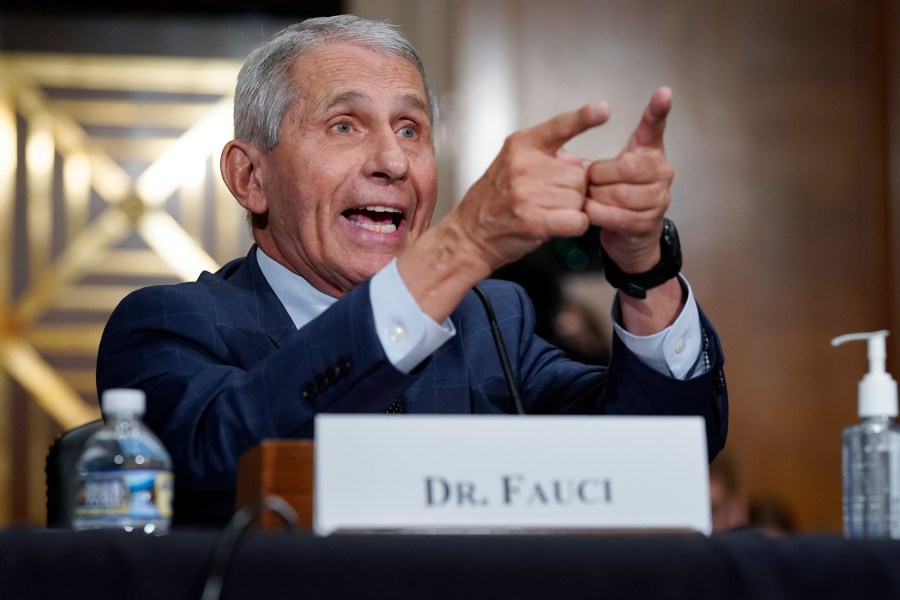 FILE - Dr. Anthony Fauci, director of the National Institute of Allergy and Infectious Diseases, responds to accusations by Sen. Rand Paul, R-Ky., as he testifies before the Senate Health, Education, Labor, and Pensions Committee about the origin of COVID-19, on Capitol Hill in Washington, July 20, 2021. (AP Photo/J. Scott Applewhite, Pool, File)