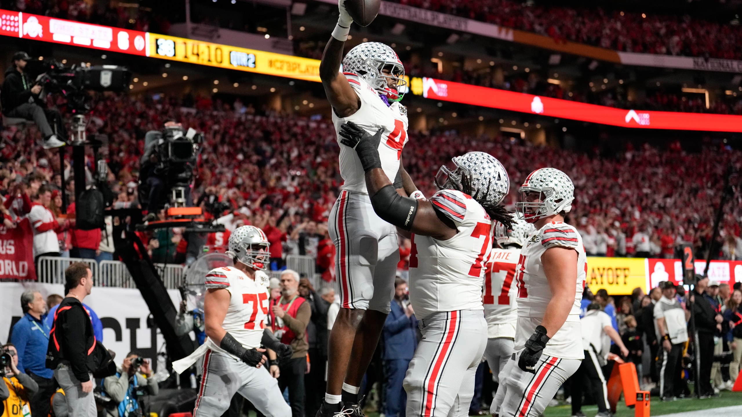 Ohio State wide receiver Jeremiah Smith celebrates after scoring against Notre Dame during first half of the College Football Playoff national championship game Monday, Jan. 20, 2025, in Atlanta. (AP Photo/Brynn Anderson)