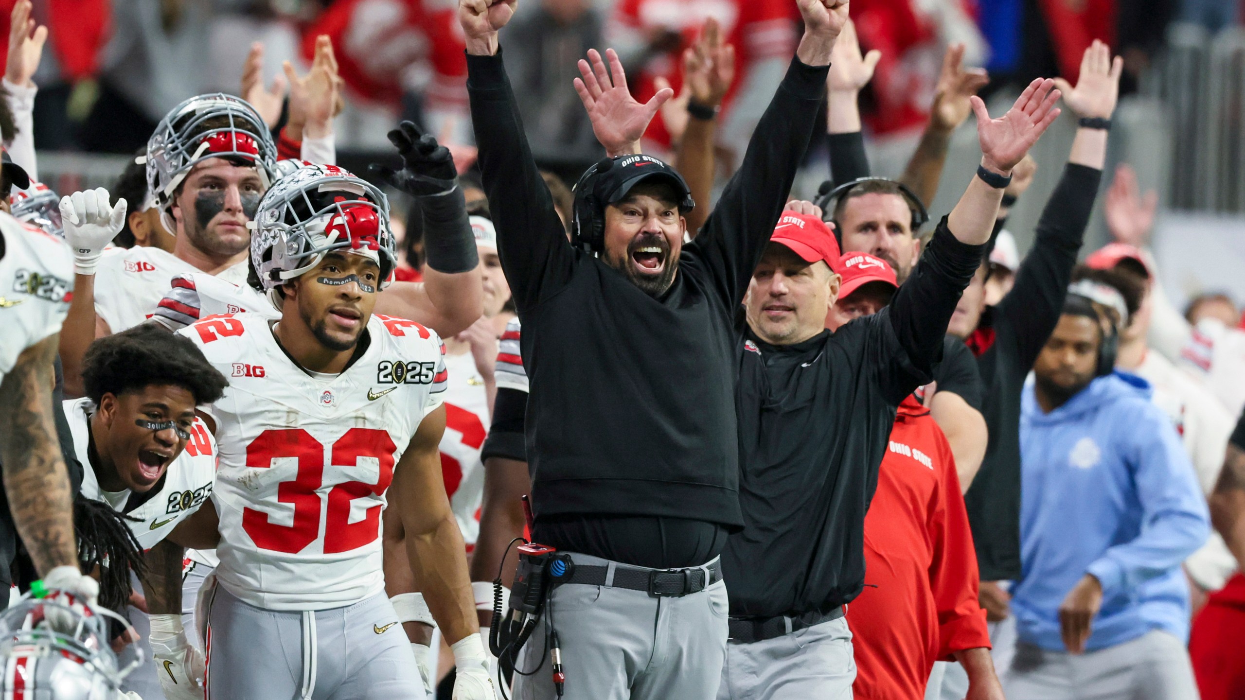 Ohio State head coach Ryan Day and staff celebrate a field goal by place kicker Jayden Fielding during the second half of the College Football Playoff national championship game against Notre Dame, Monday, Jan. 20, 2025, in Atlanta. (Jason Getz/Atlanta Journal-Constitution via AP)