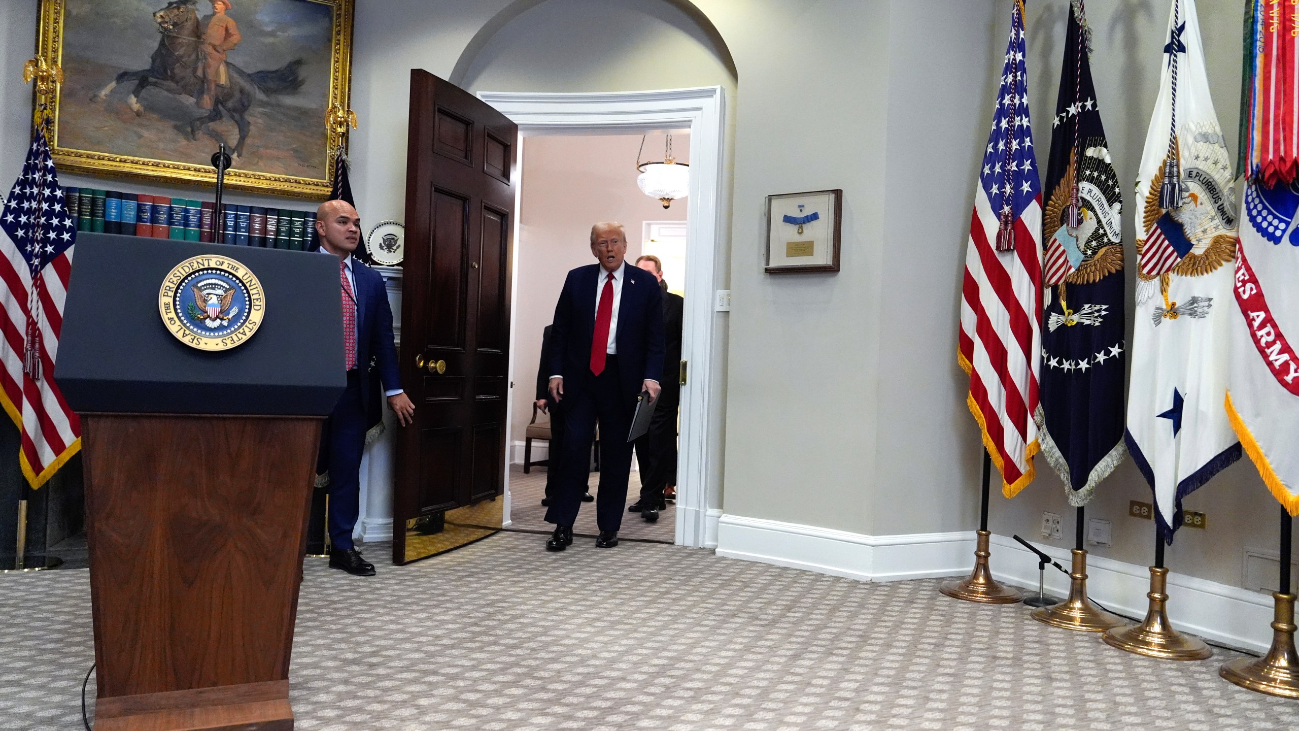 President Donald Trump arrives to speak in the Roosevelt Room at the White House, Tuesday, Jan. 21, 2025, in Washington. (AP Photo/Julia Demaree Nikhinson)