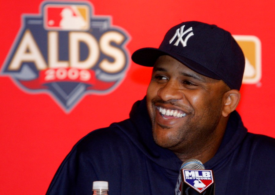 FILE - New York Yankees pitcher CC Sabathia smiles as he discusses the team's upcoming American League division series during a baseball press conference at Yankee Stadium Tuesday, Oct. 6, 2009 in New York. (AP Photo/Kathy Willens, File)