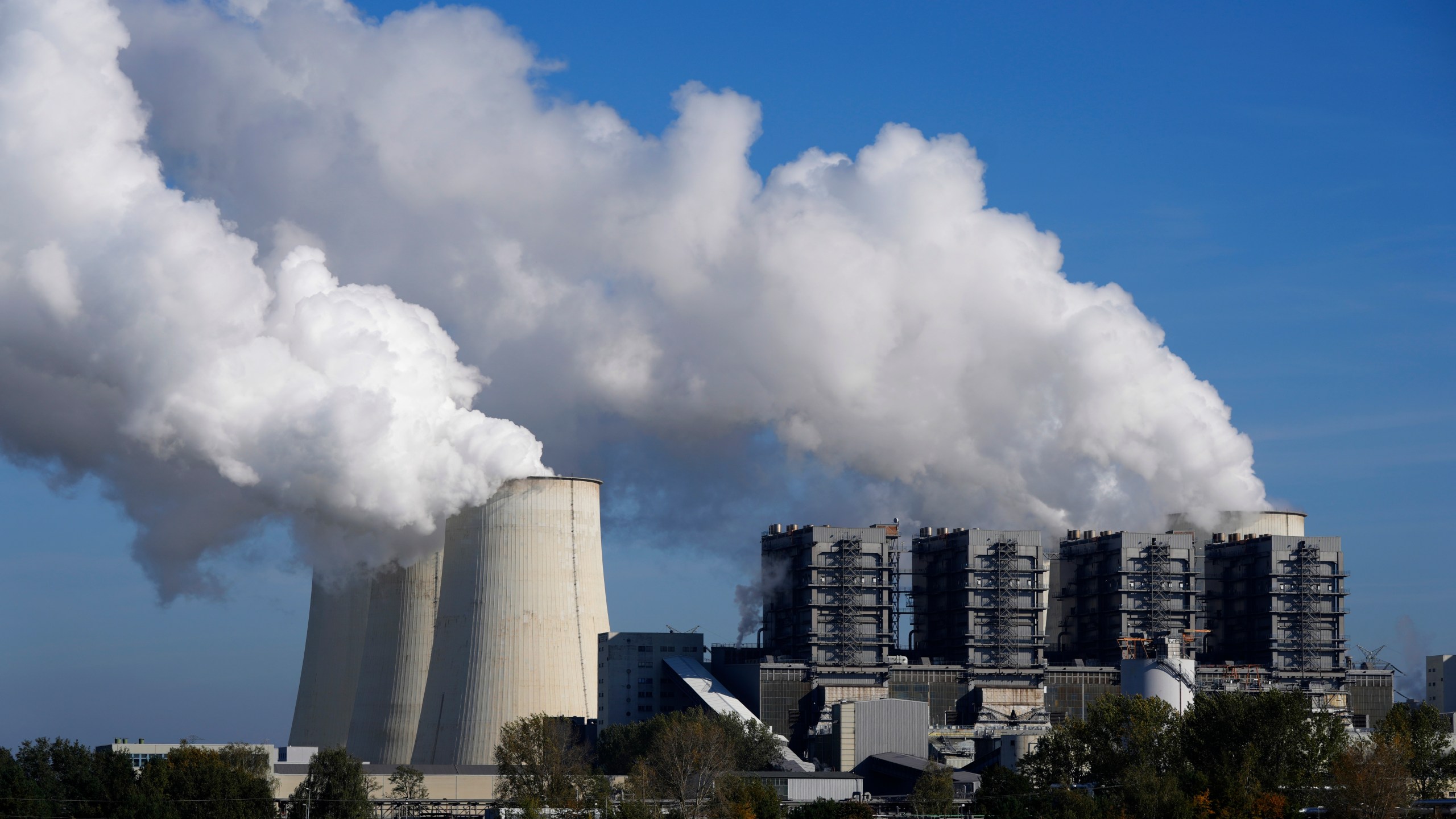 FILE - The Jaenschwalde coal-fired power plant operates in Jaenschwalde, Germany, Oct. 16, 2024. (AP Photo/Matthias Schrader, File)