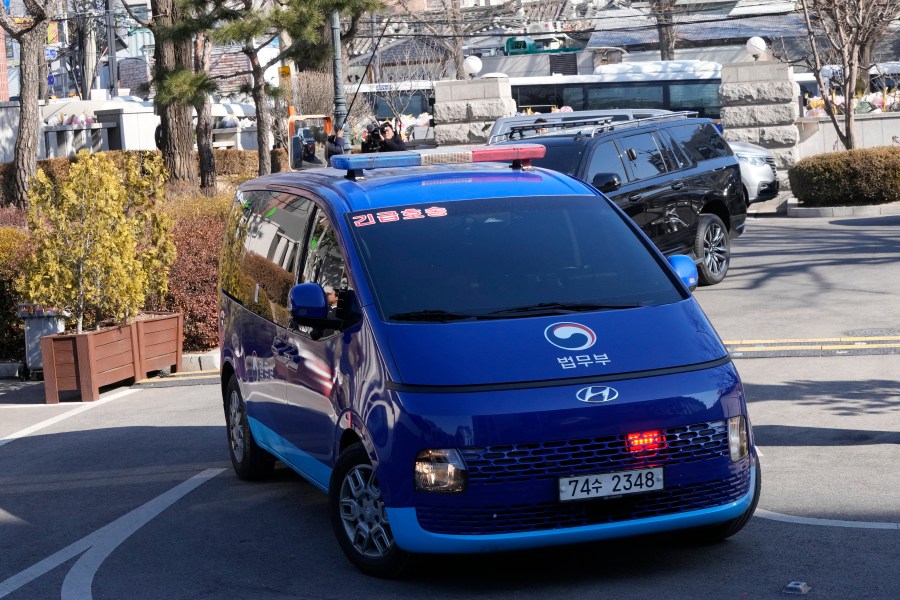 A vehicle carrying impeached South Korean President Yoon Suk Yeol arrives at the Constitutional Court in Seoul, South Korea, Thursday, Jan. 23, 2025. (AP Photo/Ahn Young-joon)