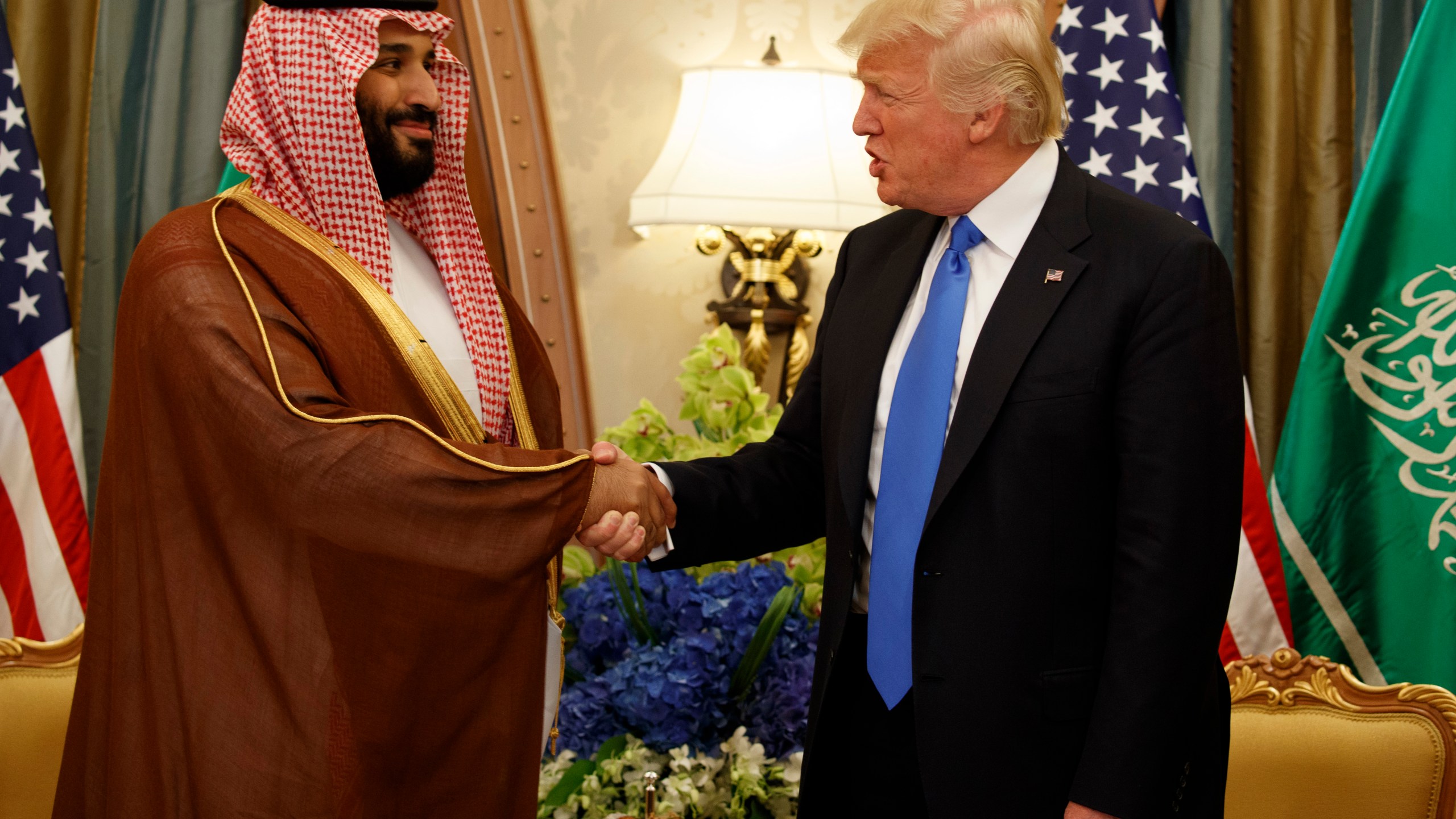 FILE- President Donald Trump shakes hands with Saudi Deputy Crown Prince and Defense Minister Mohammed bin Salman during a bilateral meeting, in Riyadh, May 20, 2017. (AP Photo/Evan Vucci, File)