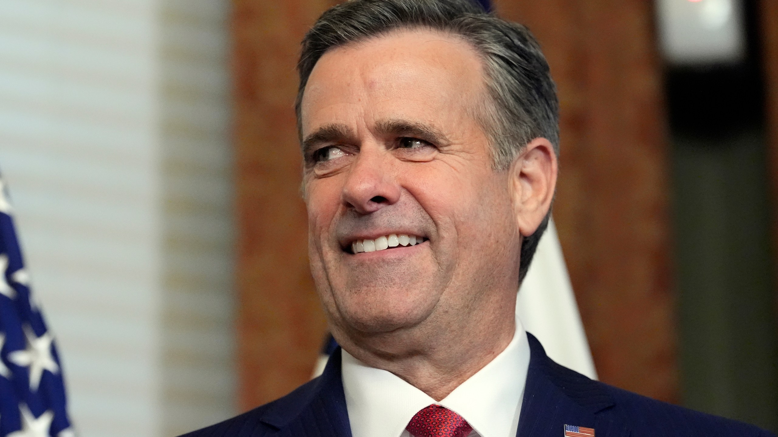 John Ratcliffe listens before Vice President JD Vance swears him in as CIA Director in the Vice Presidential ceremonial office in the Eisenhower Executive Office Building on the White House campus, Thursday, Jan. 23, 2025, in Washington. (AP Photo/Alex Brandon)