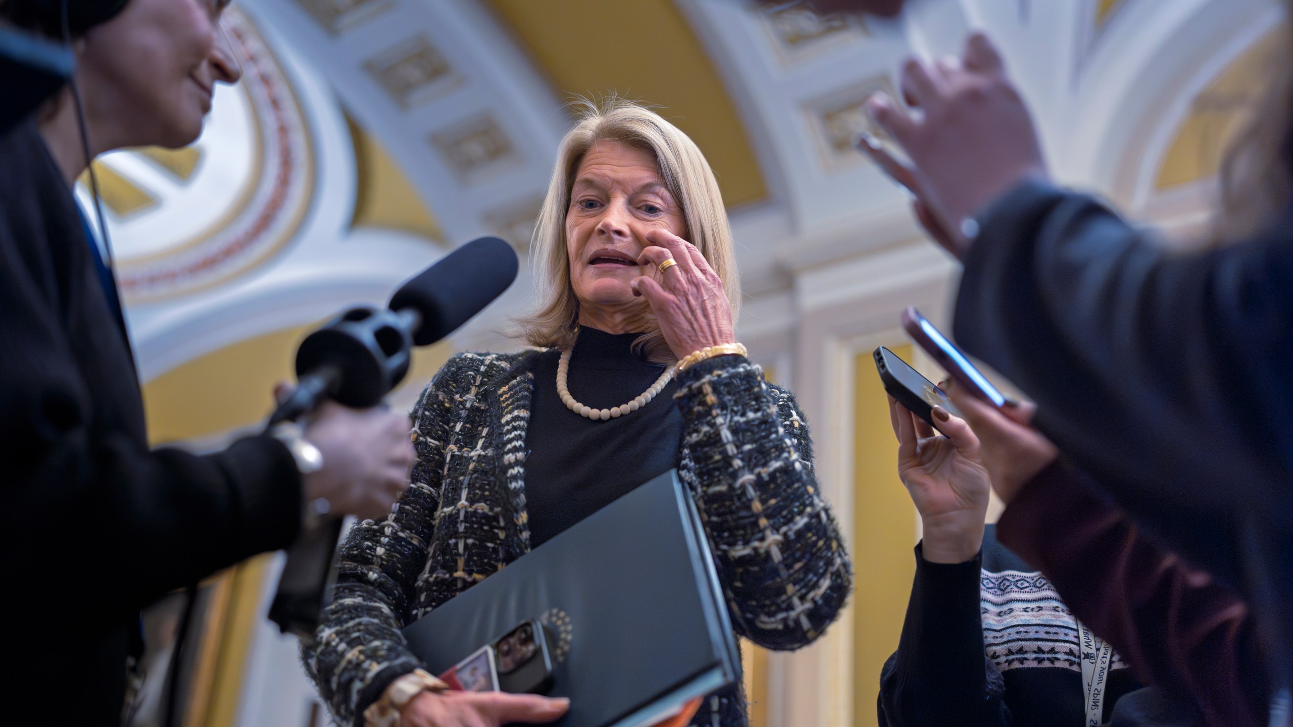 Sen. Lisa Murkowski, R-Alaska, speaks with reporters outside the Senate chamber at the Capitol in Washington, Wednesday, Jan. 22, 2025. (AP Photo/J. Scott Applewhite)