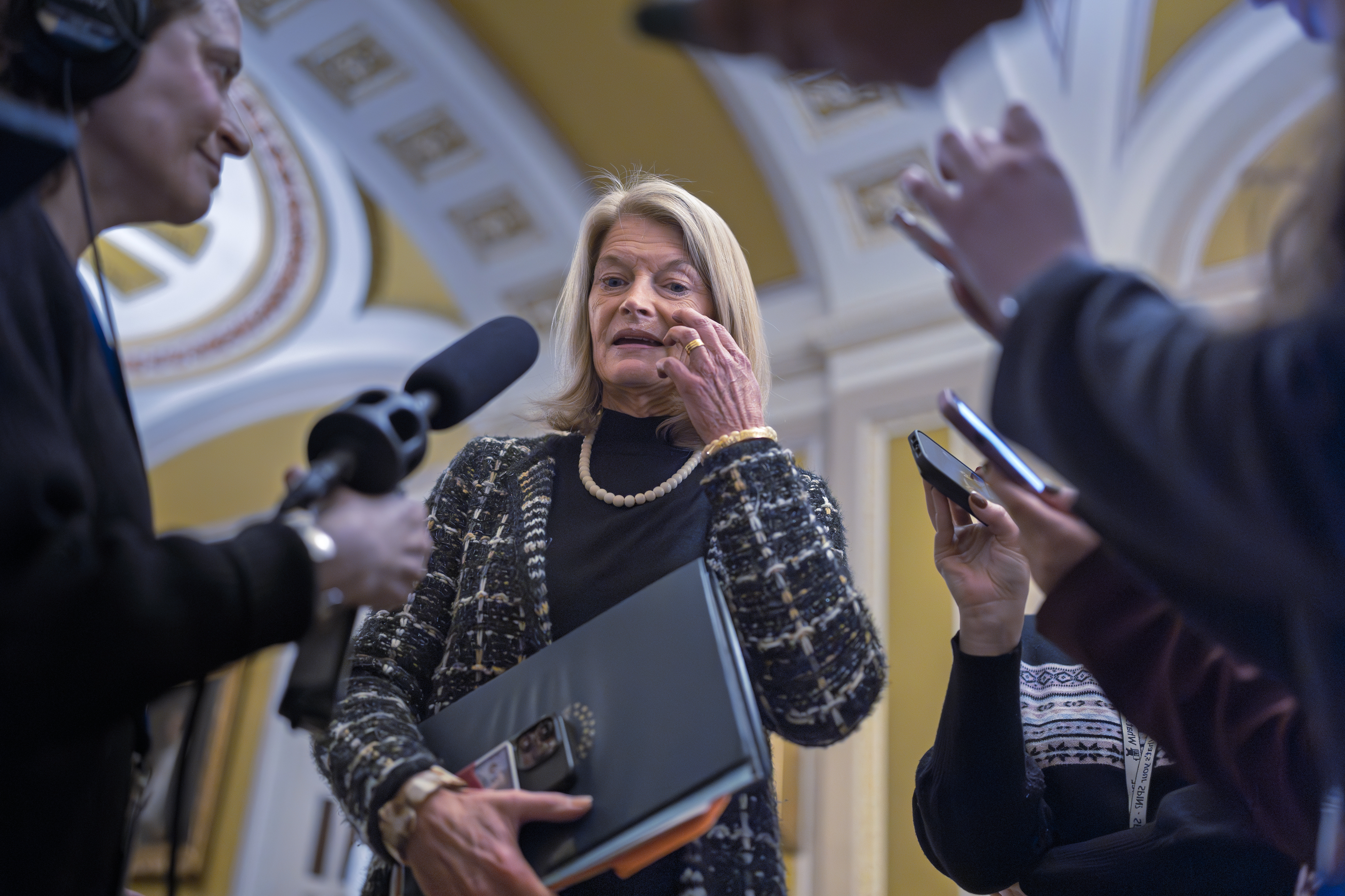 Sen. Lisa Murkowski, R-Alaska, speaks with reporters outside the Senate chamber at the Capitol in Washington, Wednesday, Jan. 22, 2025. (AP Photo/J. Scott Applewhite)