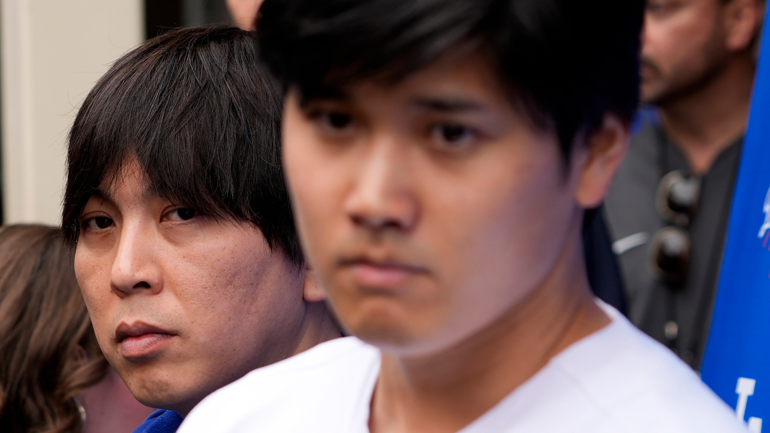 FILE - Ippei Mizuhara, left, stands next to Los Angeles Dodgers player Shohei Ohtani, right, during an interview at Dodger Stadium, Feb. 3, 2024. (AP Photo/Richard Vogel, File)