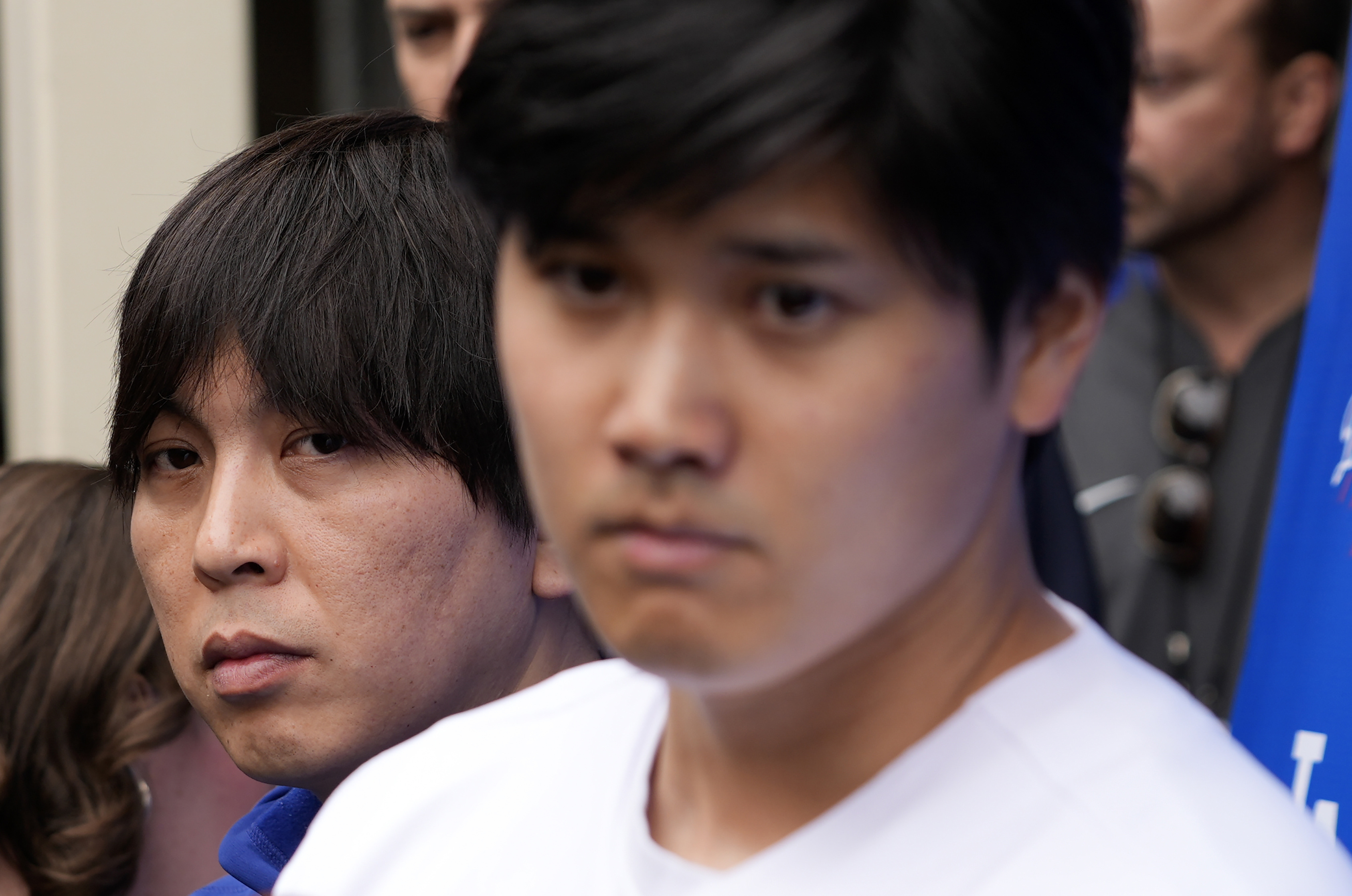 FILE - Ippei Mizuhara, left, stands next to Los Angeles Dodgers player Shohei Ohtani, right, during an interview at Dodger Stadium, Feb. 3, 2024. (AP Photo/Richard Vogel, File)