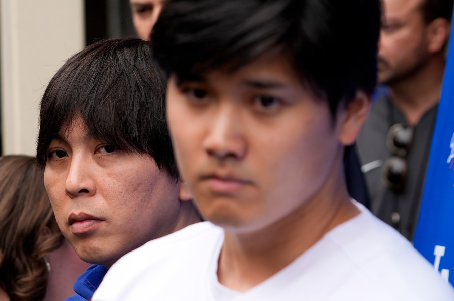 FILE - Ippei Mizuhara, left, stands next to Los Angeles Dodgers player Shohei Ohtani, right, during an interview at Dodger Stadium, Feb. 3, 2024. (AP Photo/Richard Vogel, File)