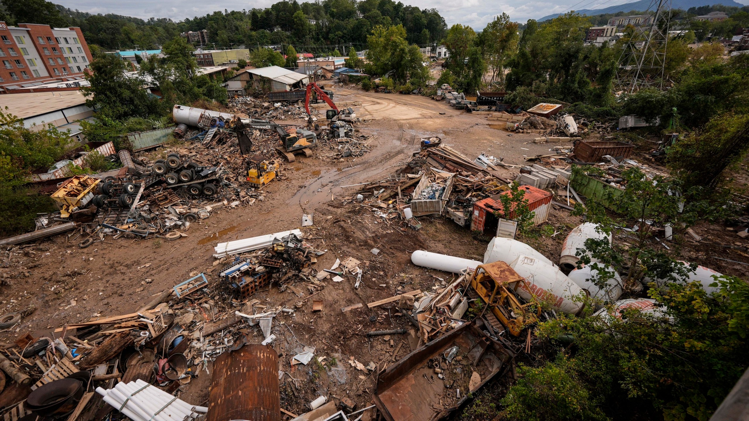 FILE - Debris is seen in the aftermath of Hurricane Helene, Monday, Sept. 30, 2024, in Asheville, N.C. (AP Photo/Mike Stewart)