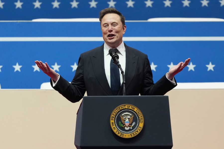 FILE - Elon Musk speaks at an indoor Presidential Inauguration parade event in Washington, Jan. 20, 2025. (AP Photo/Matt Rourke, File)