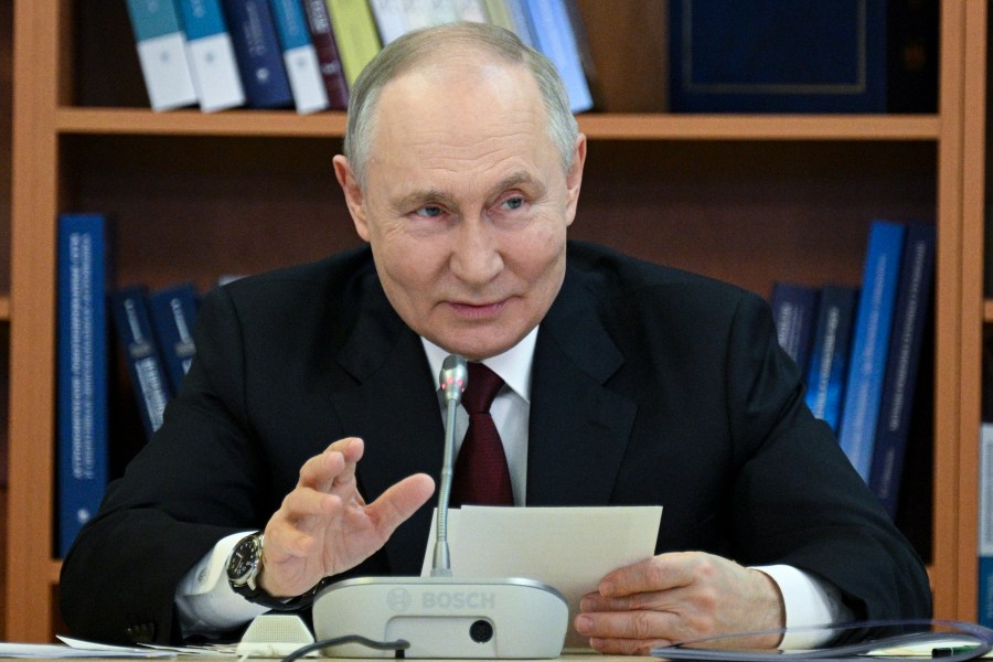 Russian President Vladimir Putin speaks during a meeting of the Board of Trustees of the Lomonosov Moscow State University in Moscow, Russia, Friday, Jan. 24, 2025. (Ramil Sitdikov, Sputnik, Kremlin Pool Photo via AP)