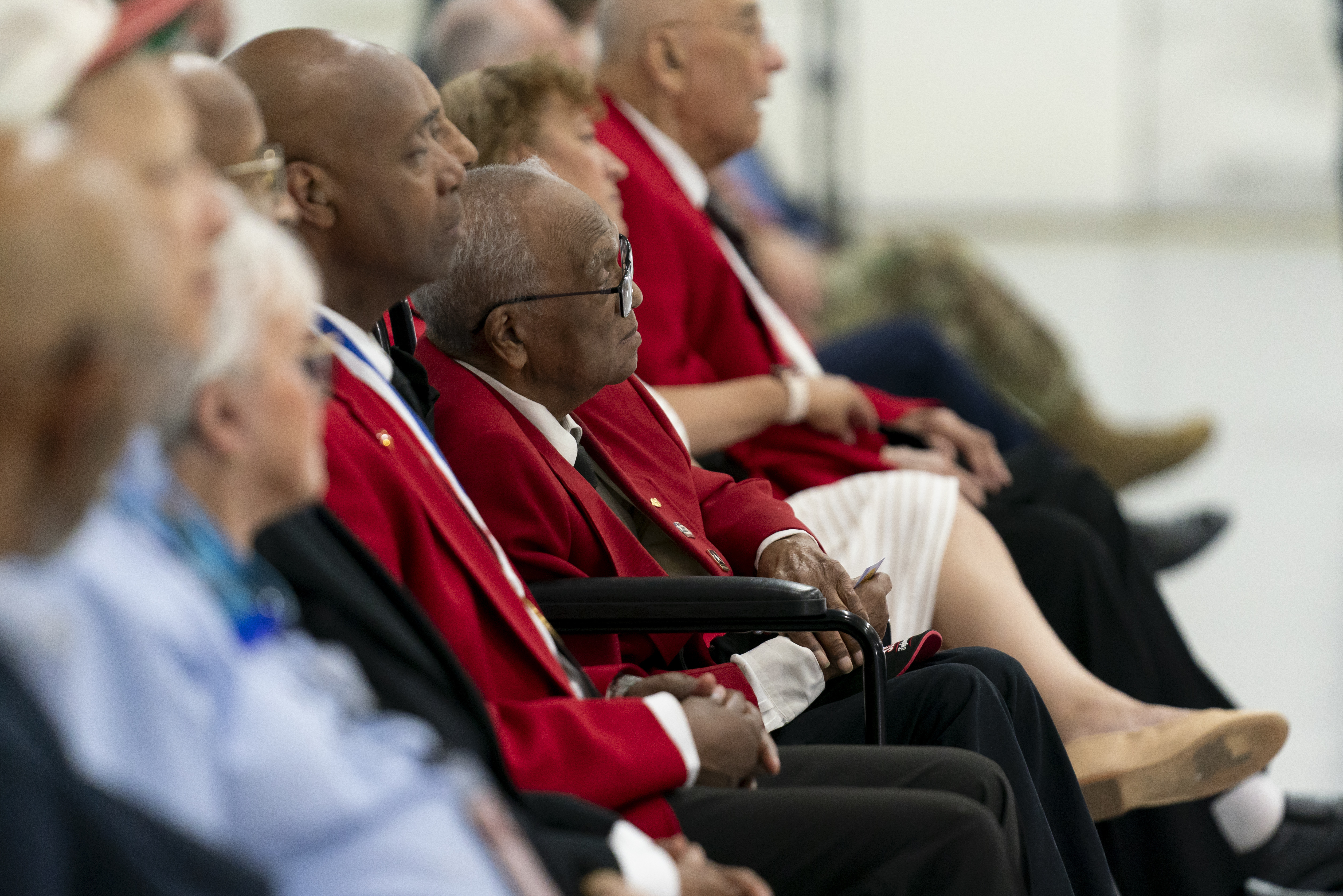 FILE - William Thomas Fauntroy Jr., center, is honored during a PT-17 aircraft exchange ceremony to commemorate the Tuskegee Airmen in recognition of the 75th anniversary of desegregation in the U.S. military, July 26, 2023, at Joint Base Andrews, Md. (AP Photo/Stephanie Scarbrough, File)