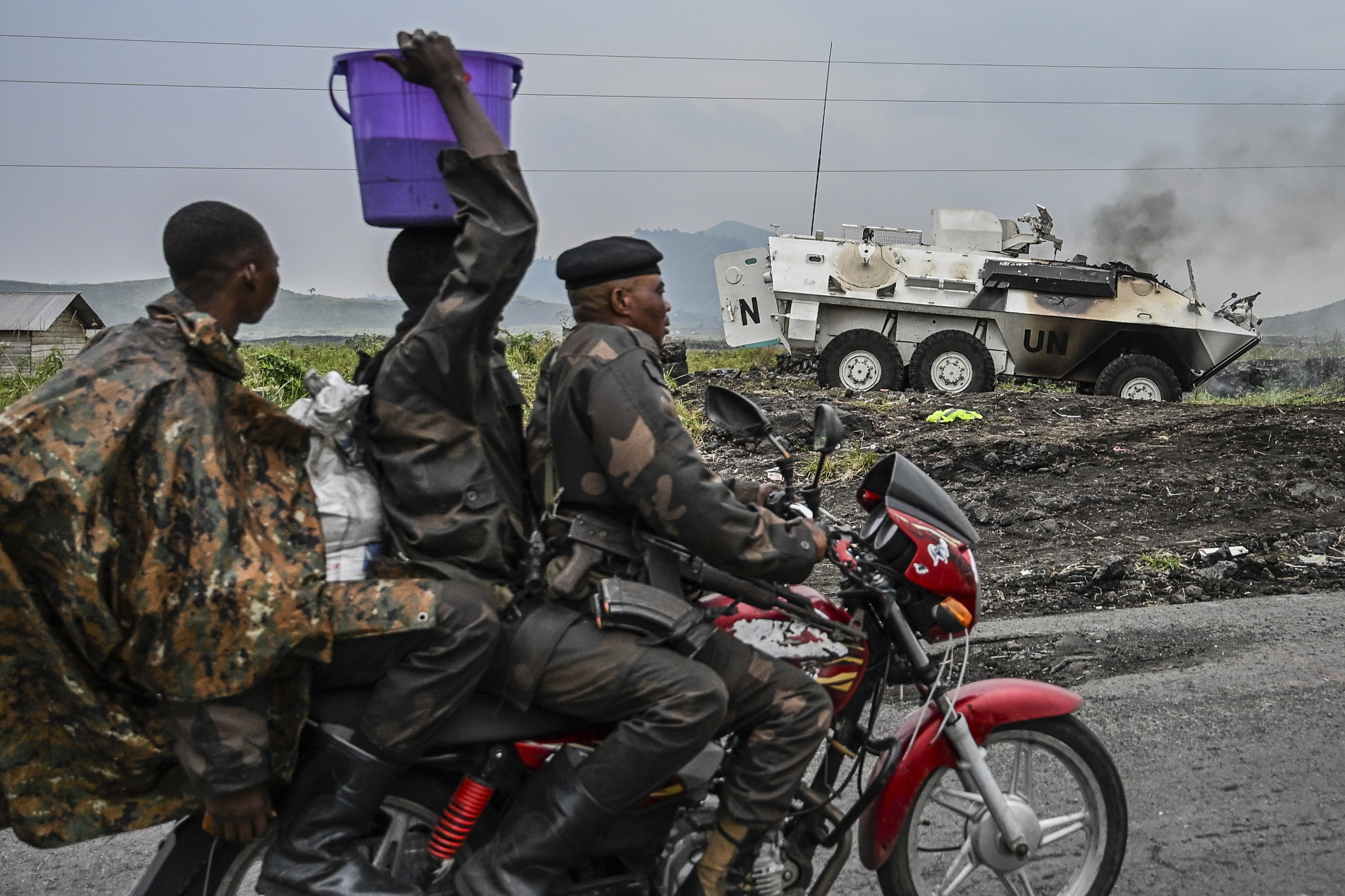 CAPTION CORRECTS YEAR A UN armoured personnel carrier burns during clashes with M23 rebels outside Goma, Democratic Republic of the Congo, Saturday, Jan. 25, 2025. (AP Photo/Moses Sawasawa)