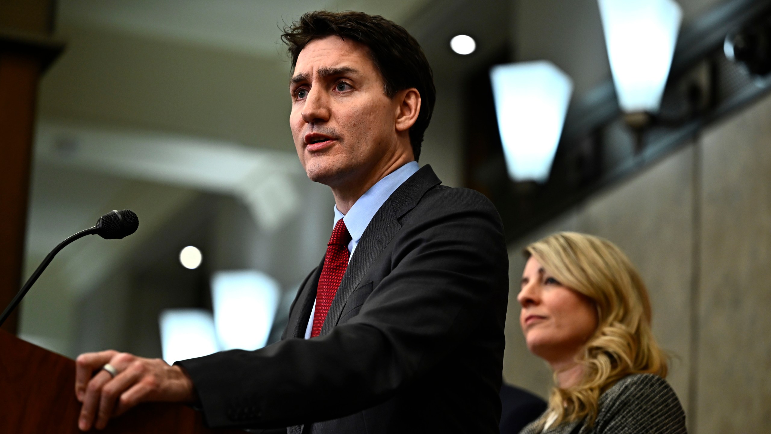 Canadian Prime Minister Justin Trudeau addresses media members after U.S. President Donald Trump signed an order to impose stiff tariffs on imports from Mexico, Canada and China, in Ottawa, Canada, Saturday, Feb. 1, 2025. (Justin Tang/The Canadian Press via AP)