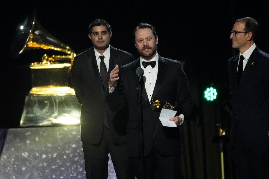 Kabir Sehgal, left, and Jason Carter accepts the award for best audiobook, narration, and storytelling recording for "Last Sundays in Plains: A Centennial Celebration" during the 67th annual Grammy Awards on Sunday, Feb. 2, 2025, in Los Angeles. (AP Photo/Chris Pizzello)