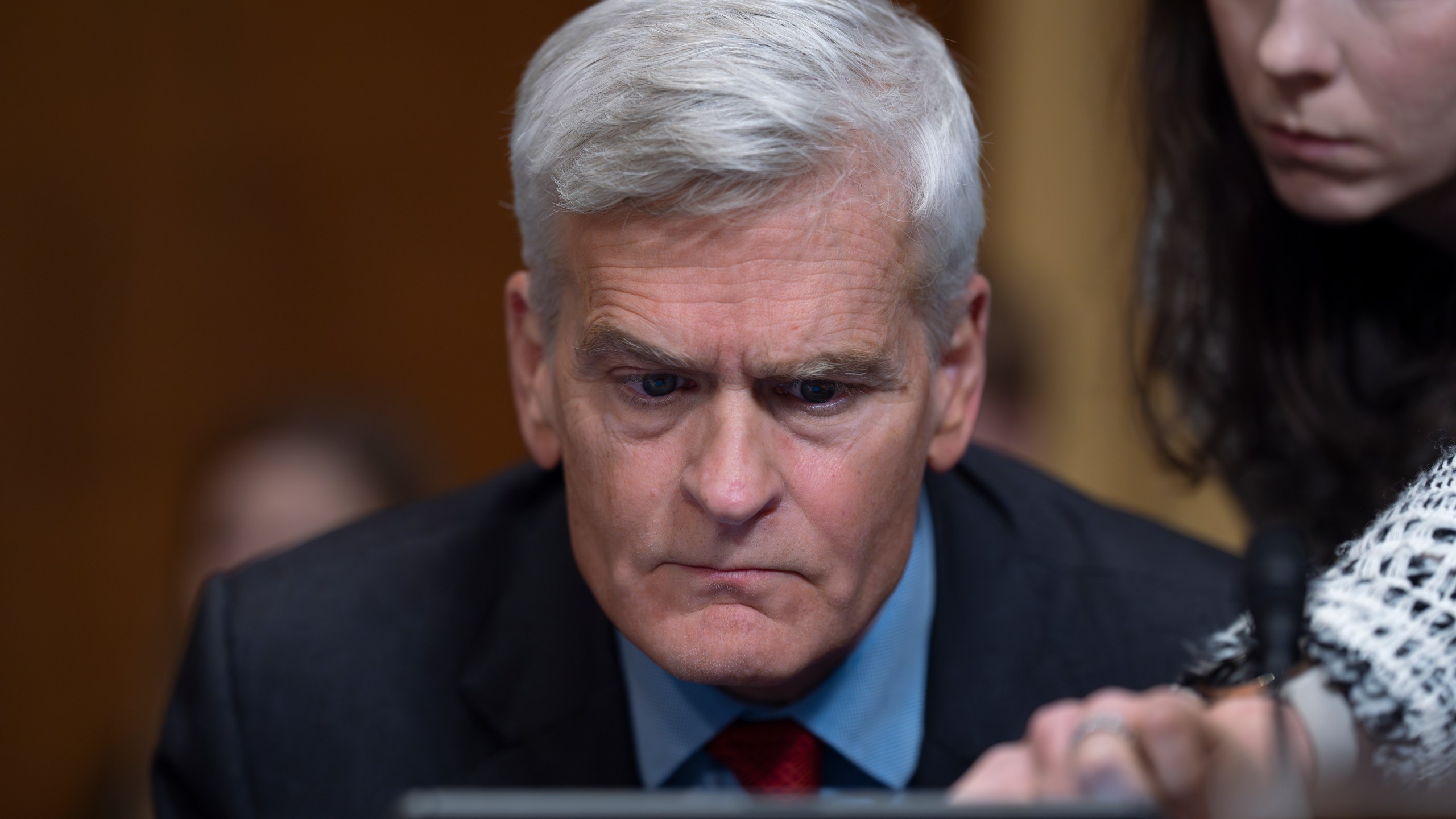 Sen. Bill Cassidy, R-La., keeps his decision until the final moment as the Senate Finance Committee holds a roll call vote to approve the nomination of Robert F. Kennedy Jr. to lead the Health and Human Services Department, at the Capitol in Washington, Tuesday, Feb. 4, 2025. (AP Photo/J. Scott Applewhite)