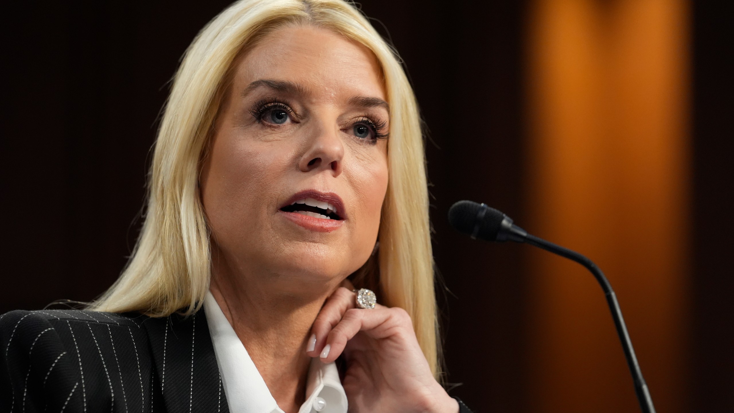 Pam Bondi, President-elect Donald Trump's choice to lead the Justice Department as attorney general, appears before the Senate Judiciary Committee for her confirmation hearing, at the Capitol in Washington, Wednesday, Jan. 15, 2025. (AP Photo/J. Scott Applewhite)