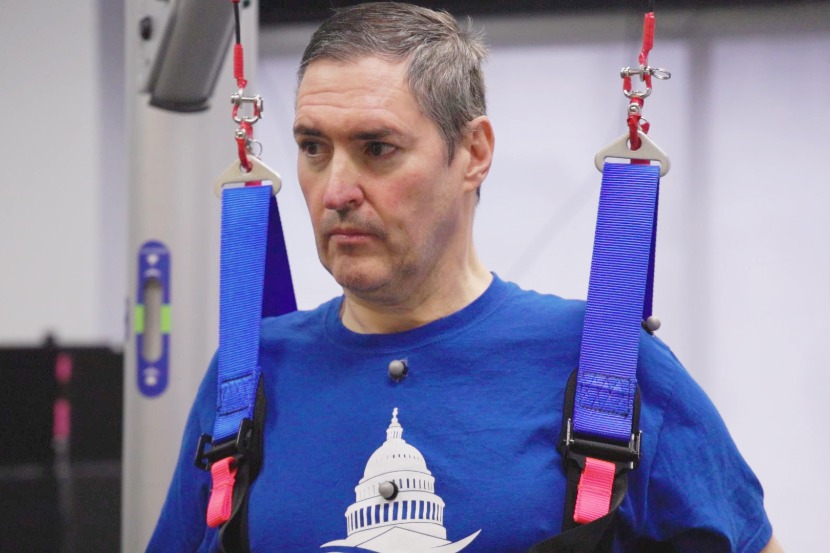 This image from video provided by UPMC and University of Pittsburgh Health Sciences shows Doug McCullough, who has spinal muscular atrophy, during tests of experimental spinal cord stimulation to improve muscle function in Pittsburgh, on March 14, 2023. (UPMC, University of Pittsburgh Health Sciences via AP)