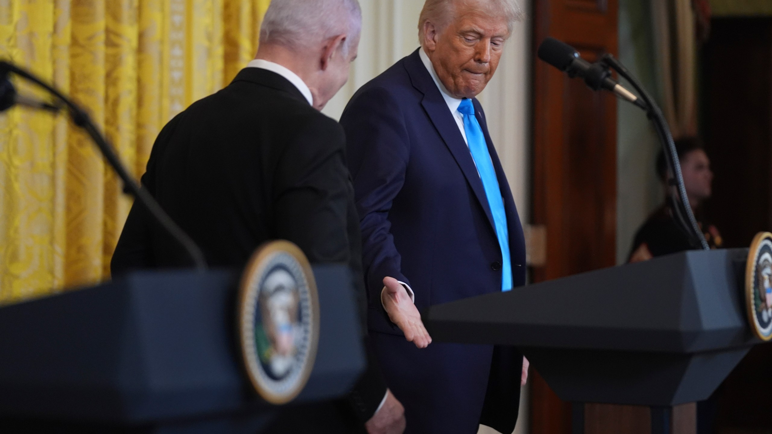 President Donald Trump shakes hands with Israel's Prime Minister Benjamin Netanyahu after a news conference in the East Room of the White House, Tuesday, Feb. 4, 2025, in Washington. (AP Photo/Evan Vucci)